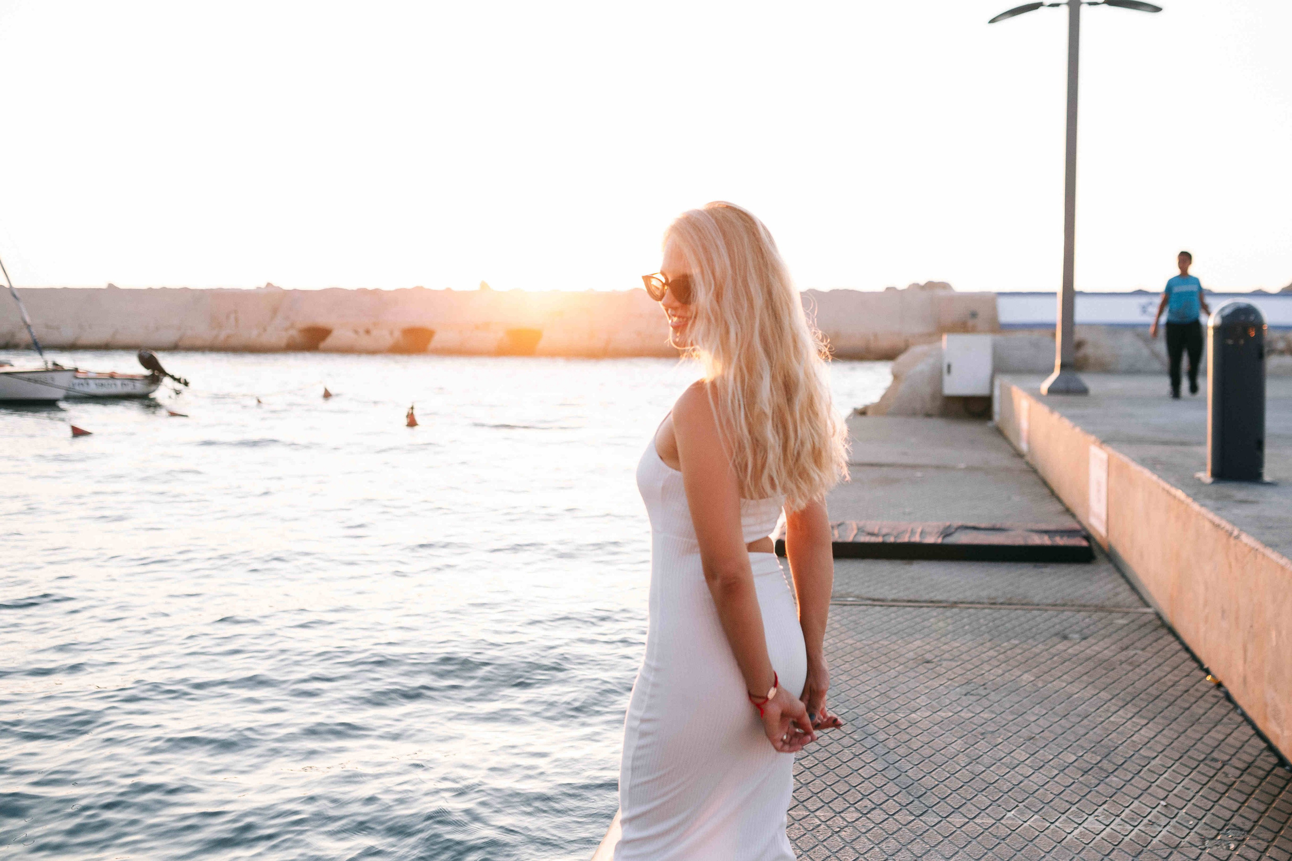 SUNSET IN JAFFO PORT. PHOTOGRAPHER IN ISRAEL