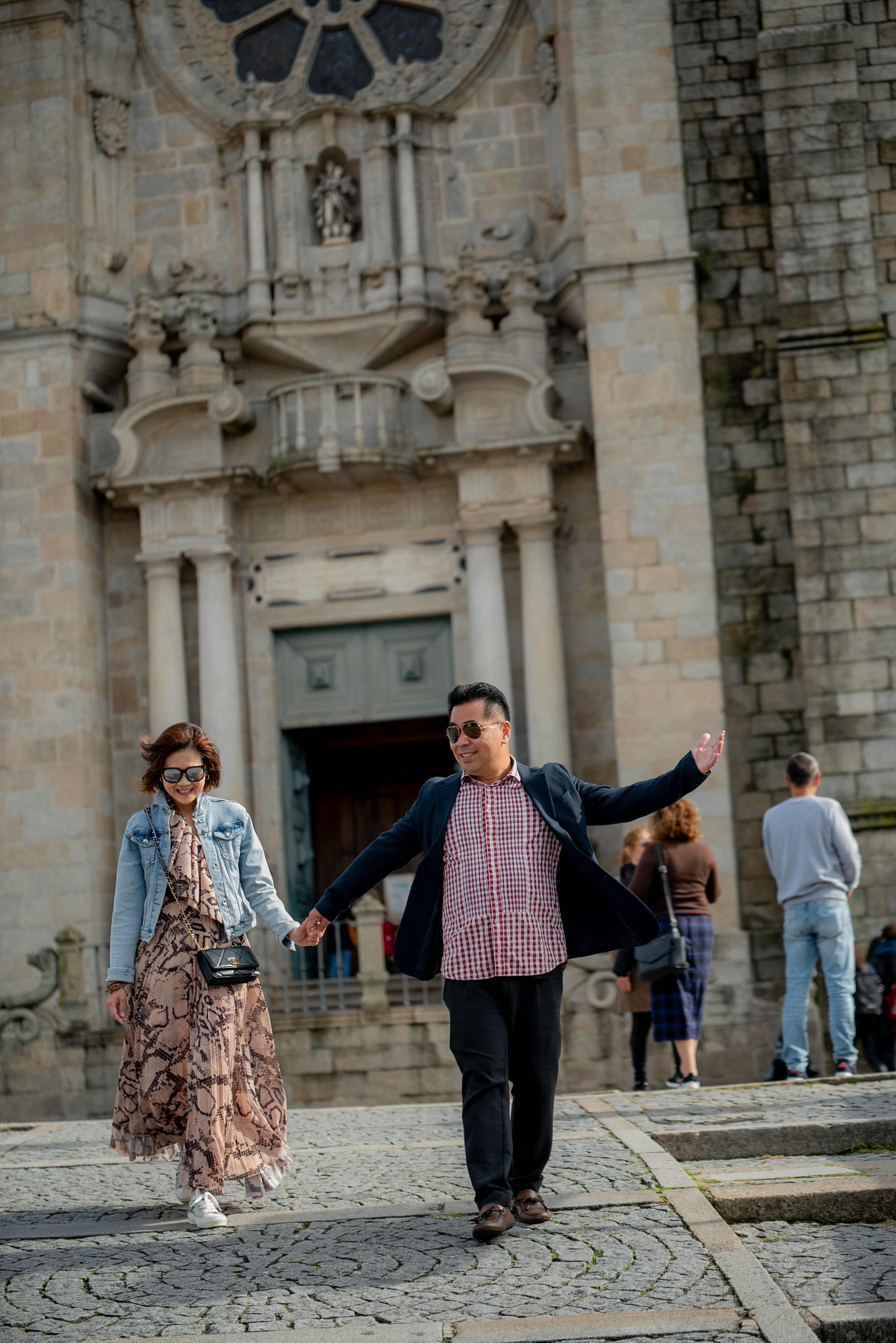 YOKE and ALFRED. Walking in Porto after the rain. Anastasiia Antoniuk portrait, family and couple photographer, Portugal