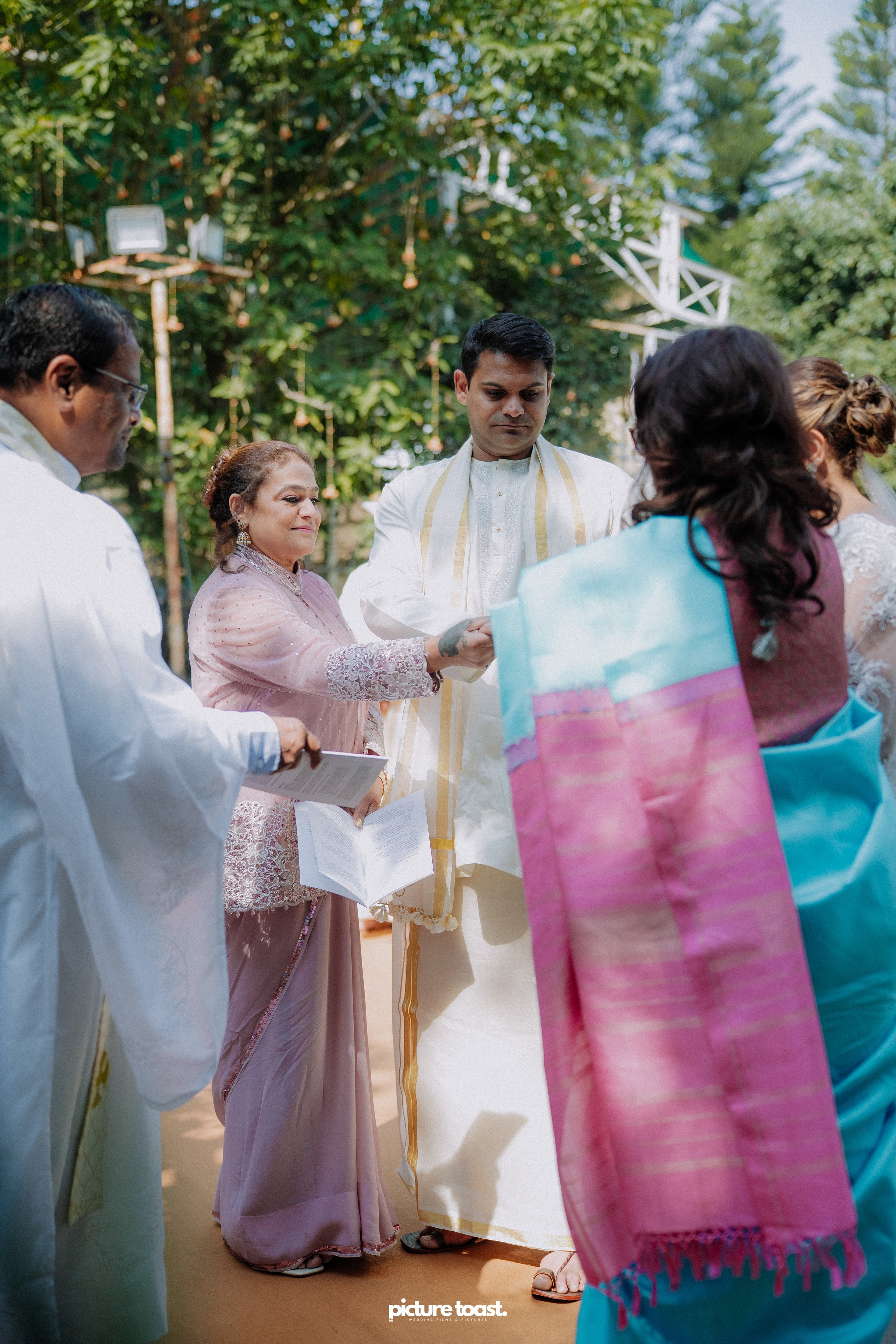 Blessing of Rajiv & Aashna. Fine art Wedding Photographers in India & Canada