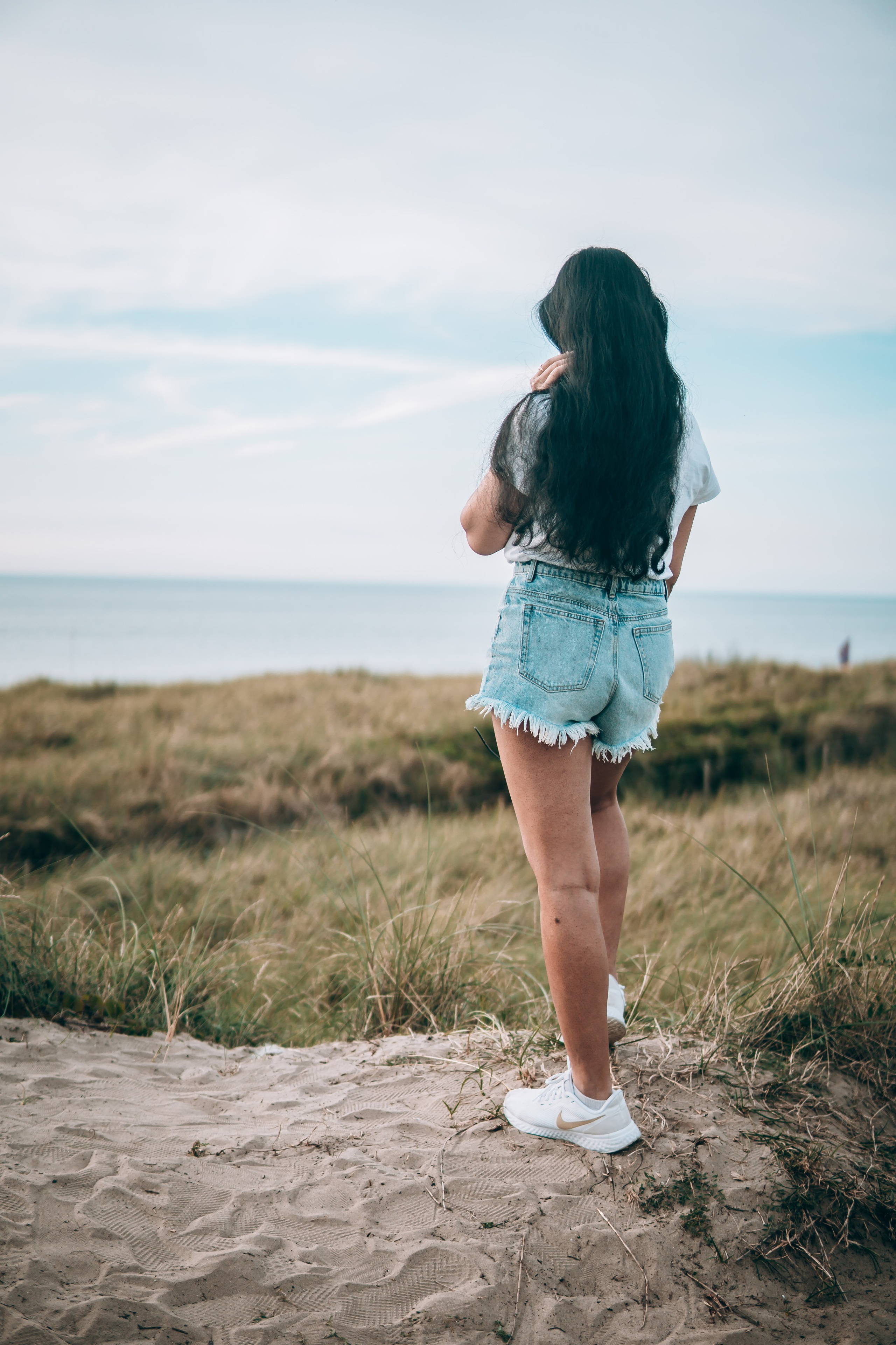 Woman staring at the sea