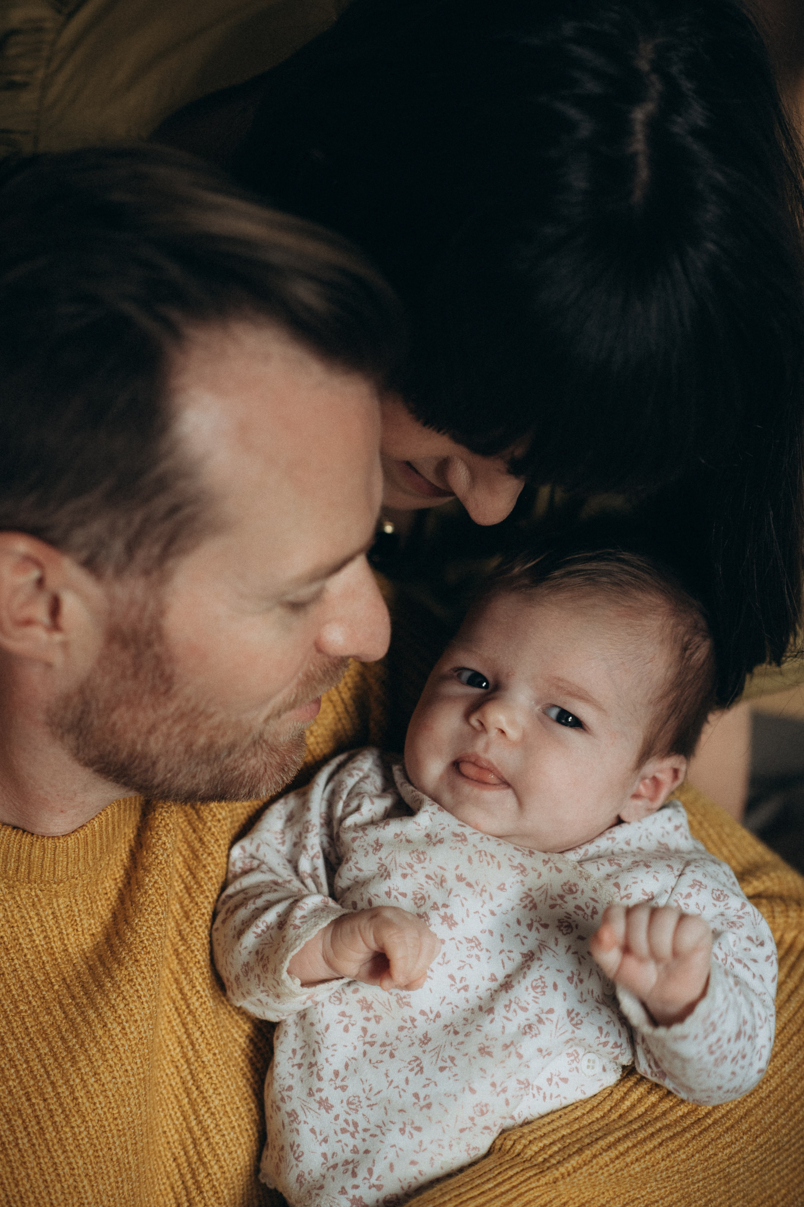 newborn baby girl with her parents