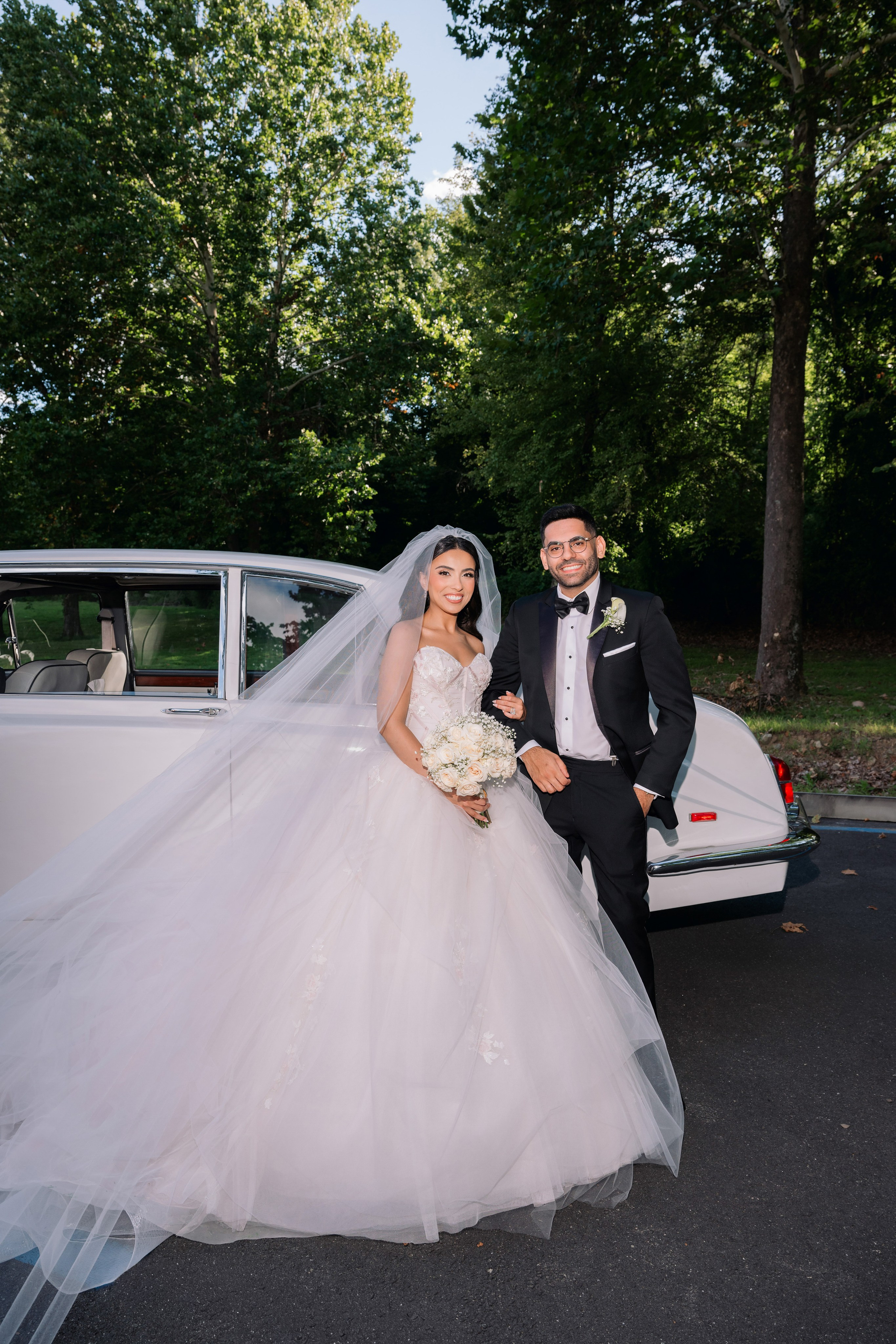 Groom smiling at bride during a candid getting ready moment