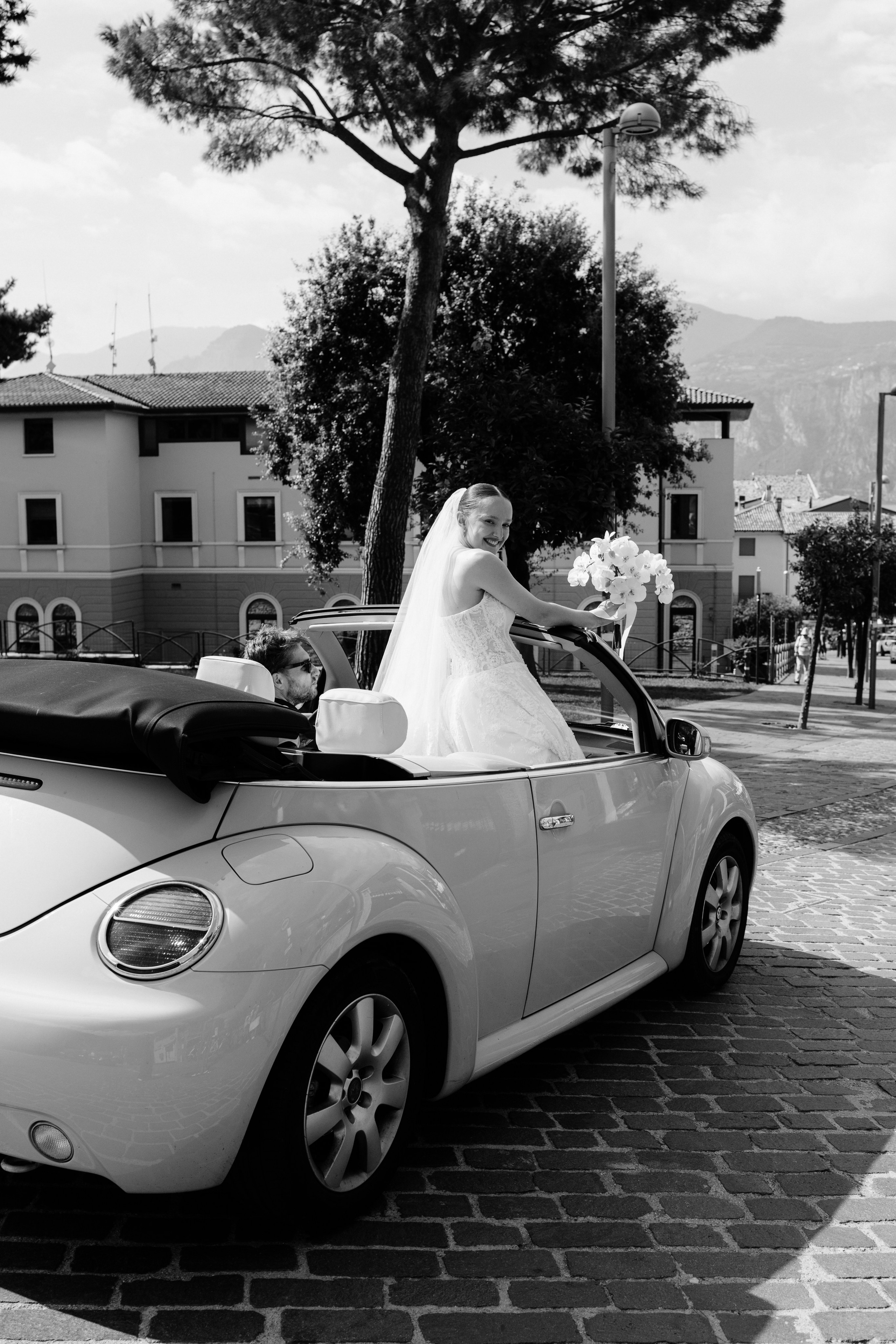 Romantic bride portrait by Lake Garda