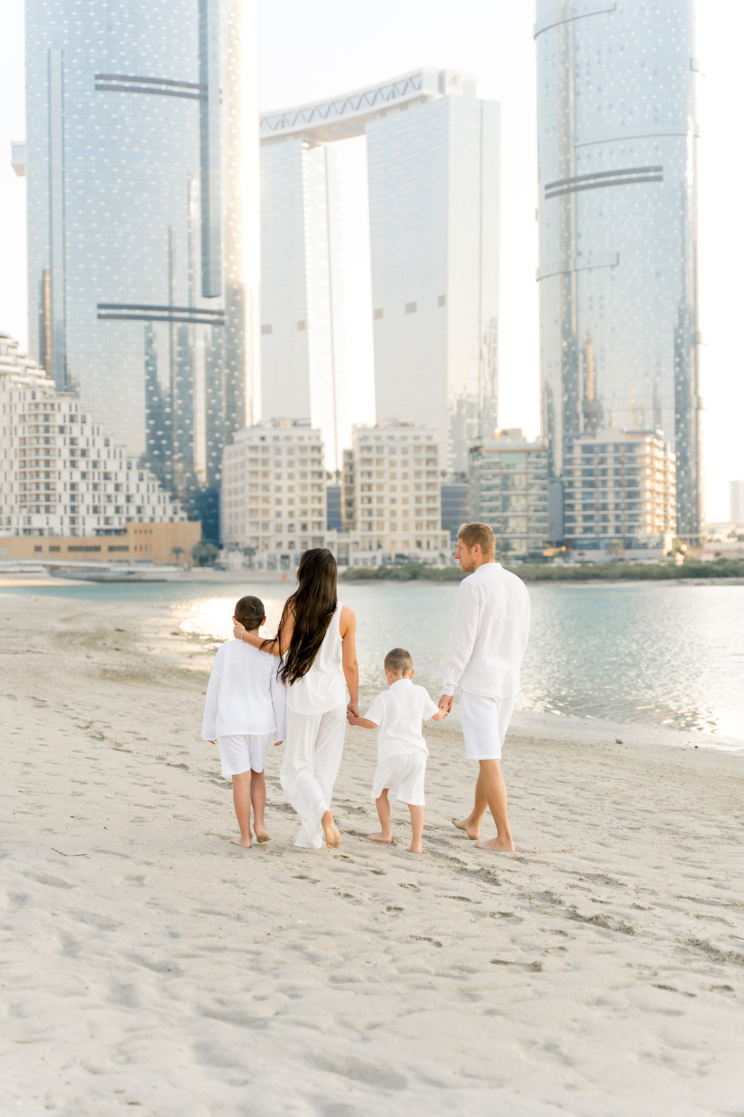 Sunset family photoshoot at Reem Island Abu Dhabi with soft natural light