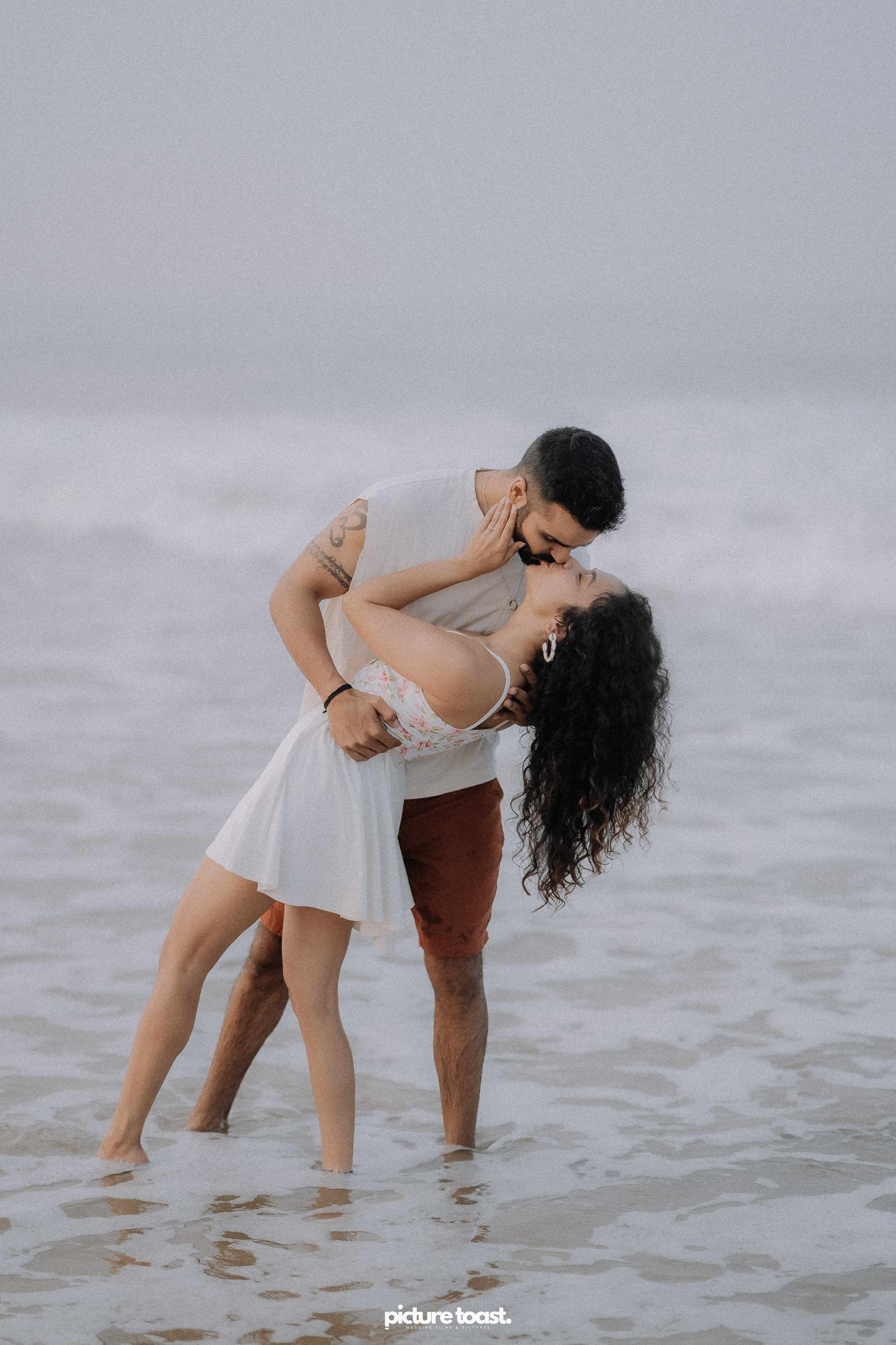 Love In The Beach. Fine art Wedding Photographers in India & Canada