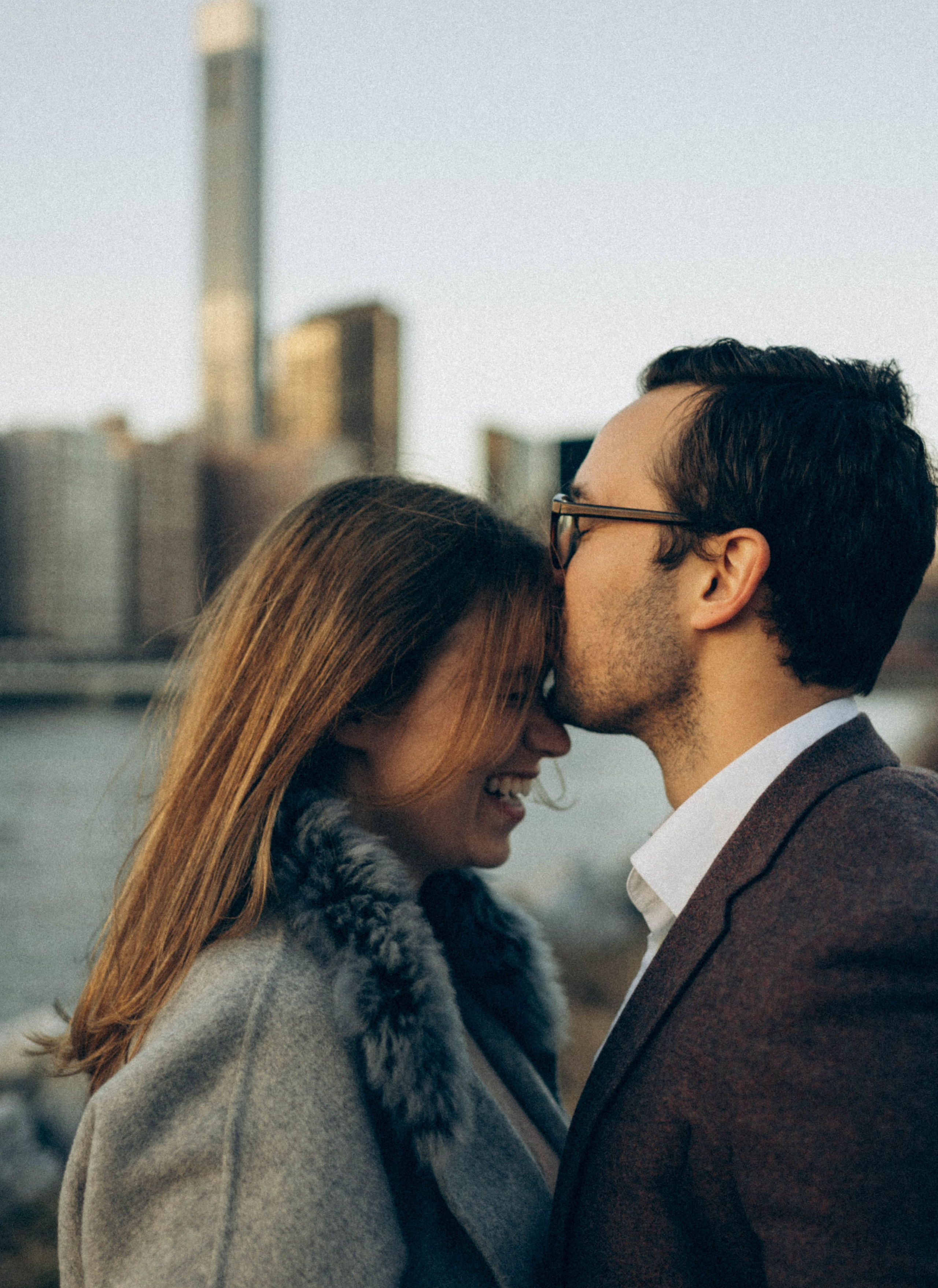 Proposal in Dumbo waterfront with skyline reflections.