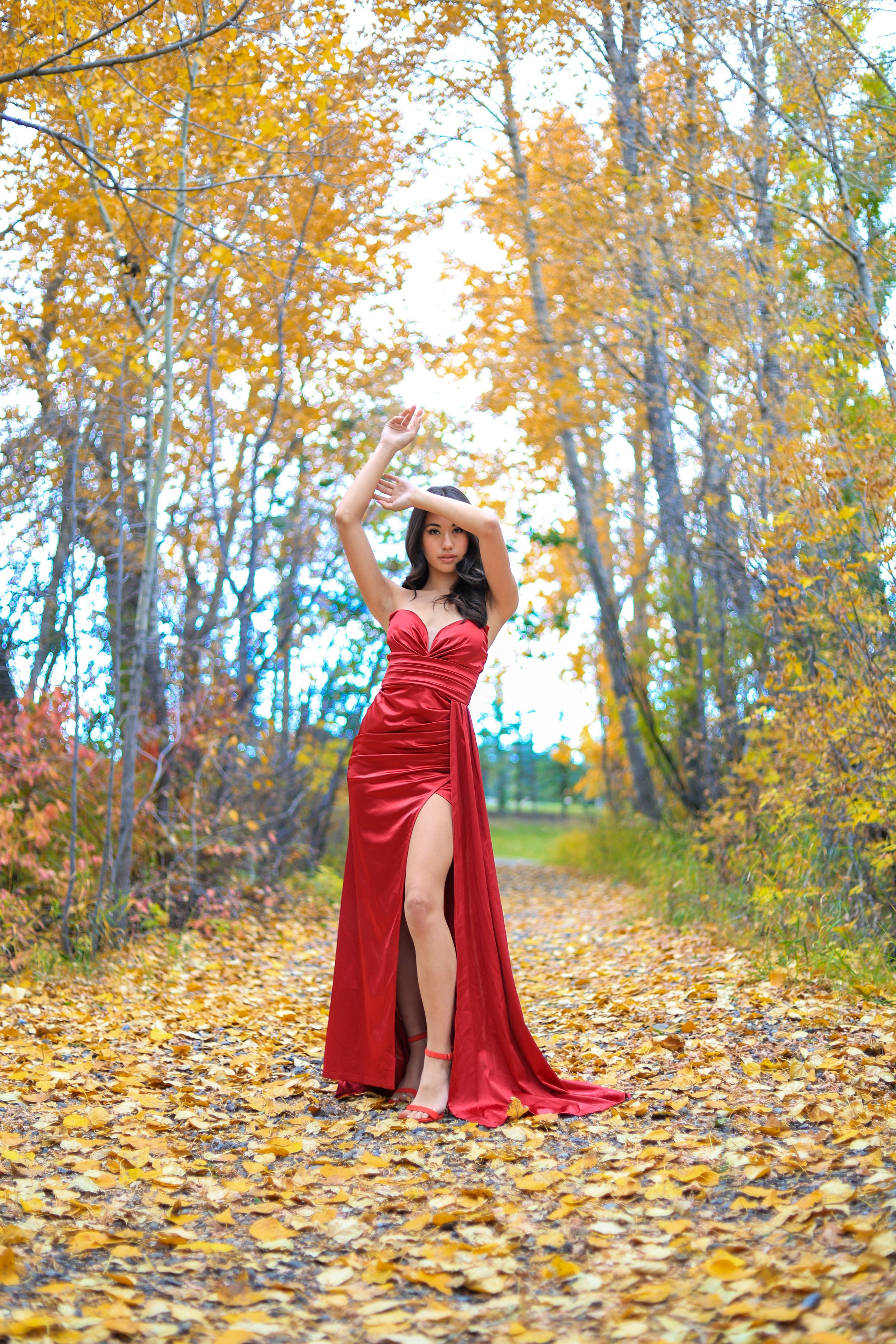 Autumn Elegance: Sidney Jean Victoria in a Red Dress. ProFly.club — Professional aerial filming in Calgary