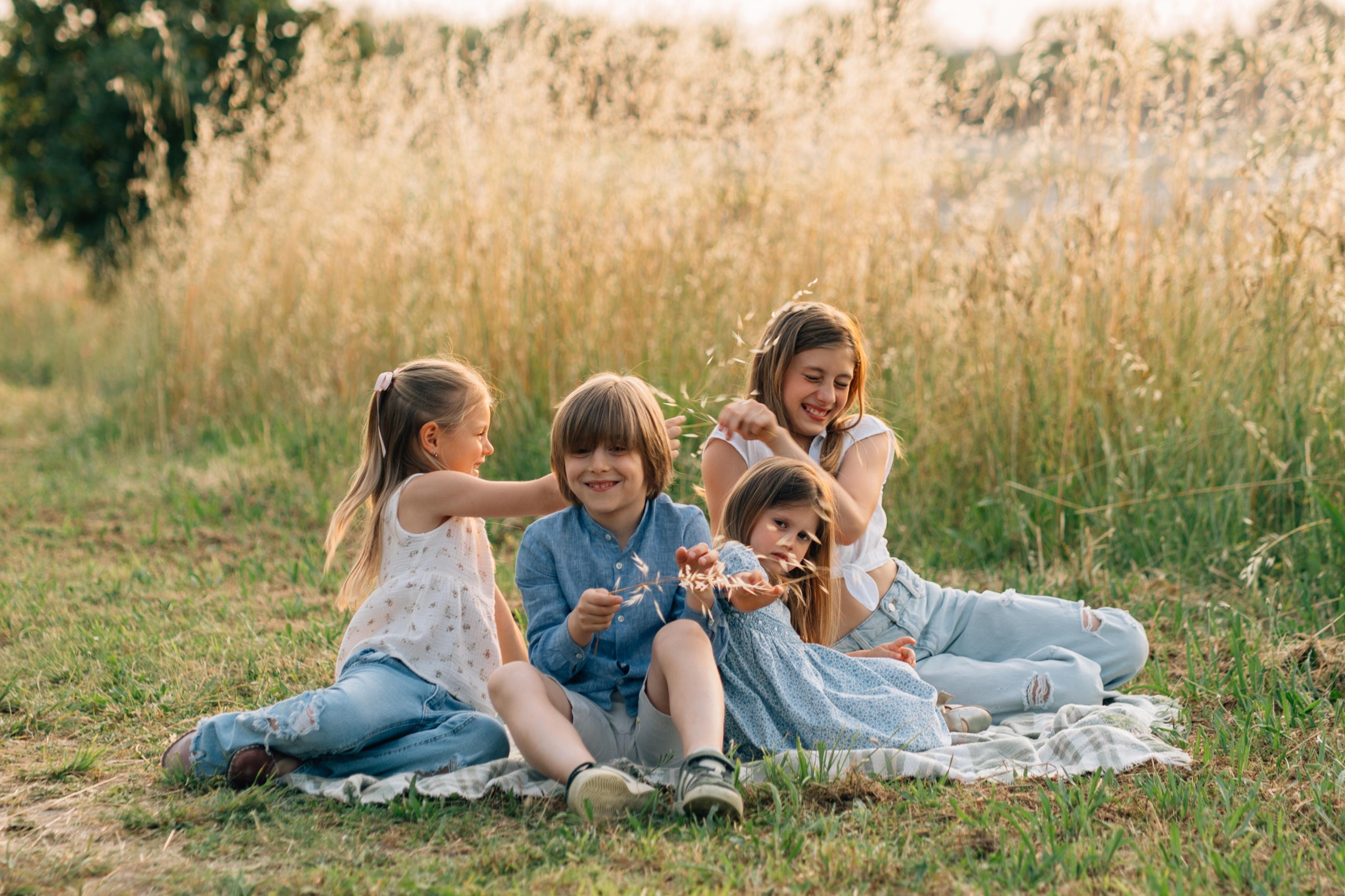 Servizio fotografico di famiglia in un parco a Rimini, Italia. Fotografa di matrimoni e di famiglia in Italia