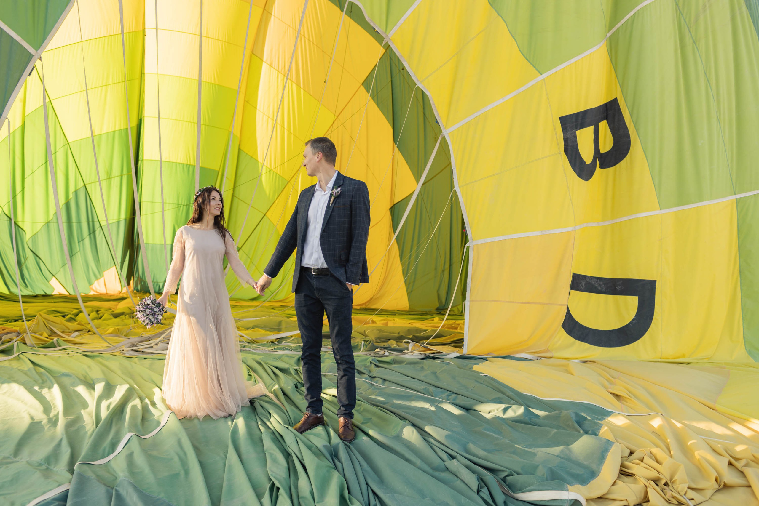 Magical Wedding Photoshoot in Cappadocia: Balloons, Caves, and Valleys. Julia Ganch I Fashion Wedding Photography I Cappadocia Turkey