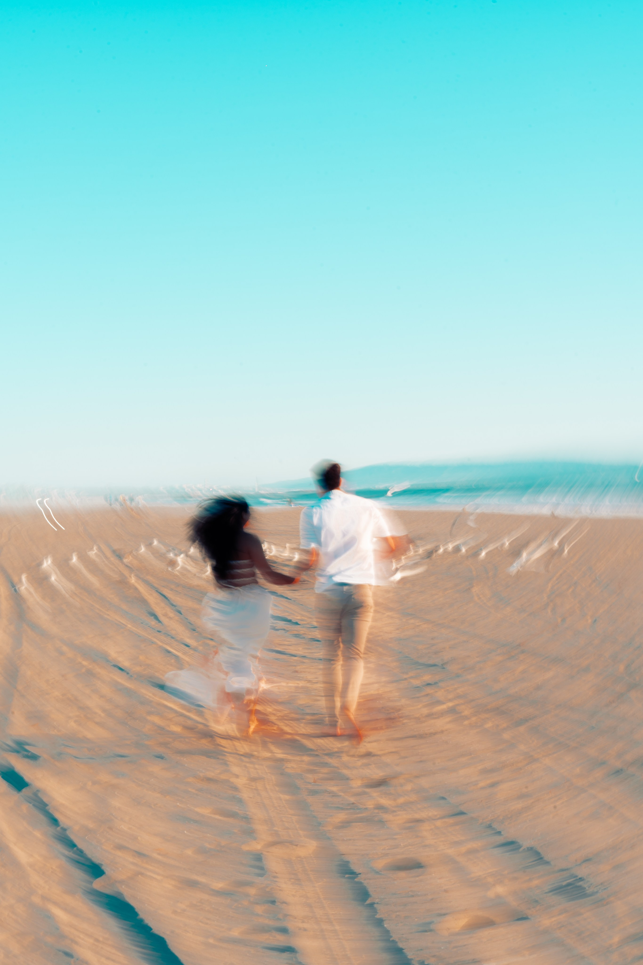 Artistic engagement photography on the beach in Santa Monica
