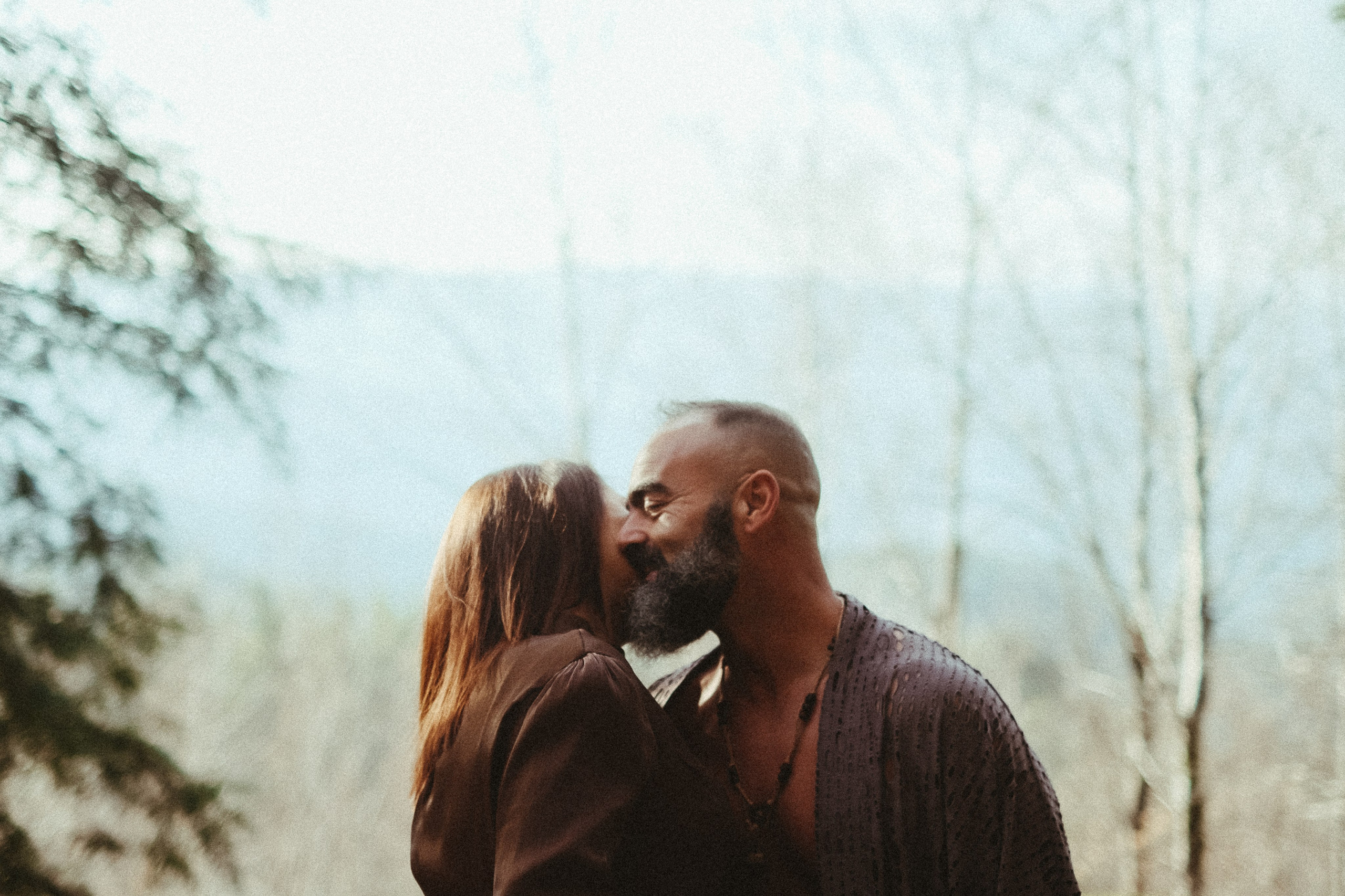 Romantic forest engagement session in Portugal with earthy tones