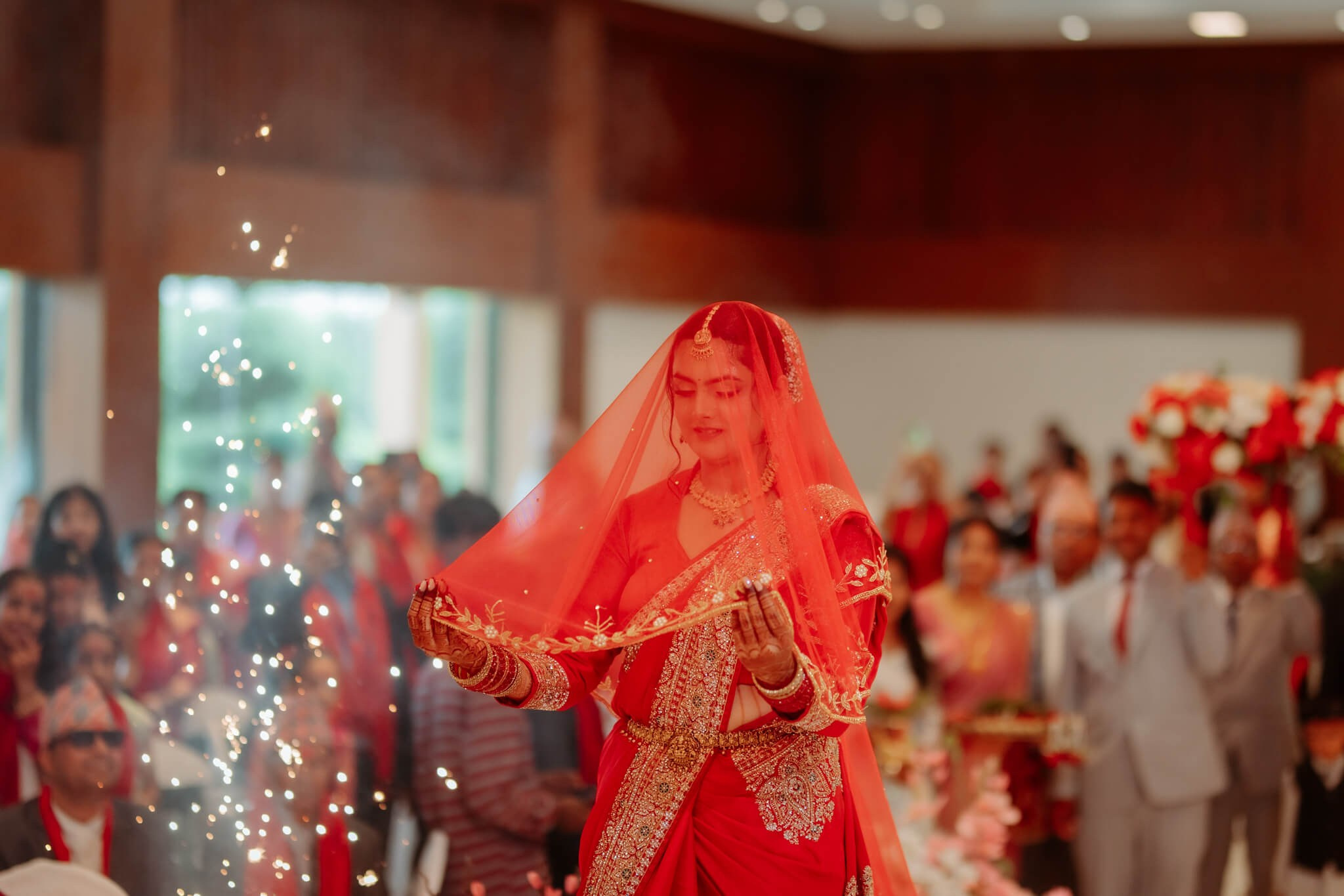 Bride entering the wedding ceremony in traditional Nepali bridal attire Chitwan Wedding Photography.