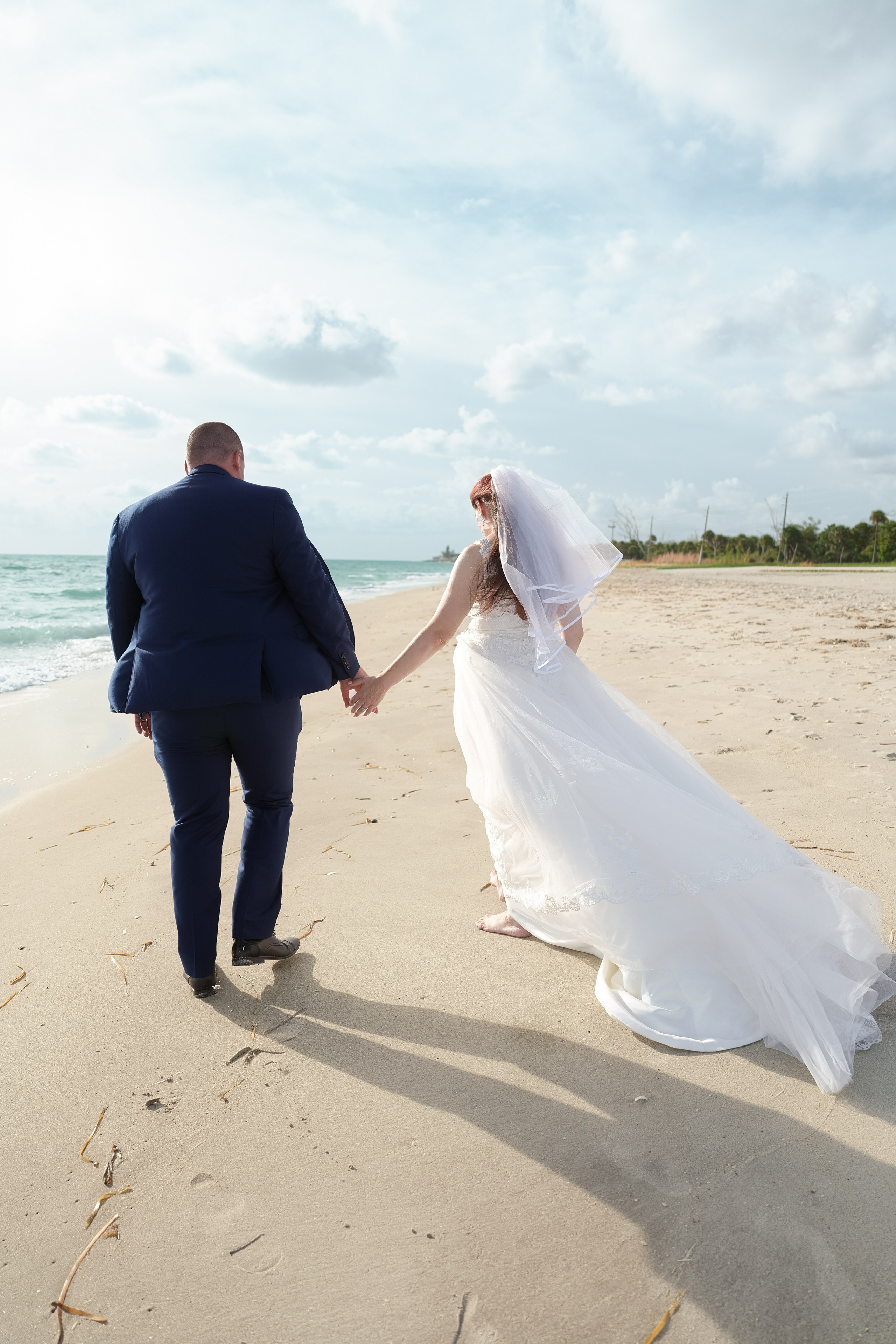 Beach Wedding in Englewood, Florida. Wedding and family photographer Olga Belianskaia
