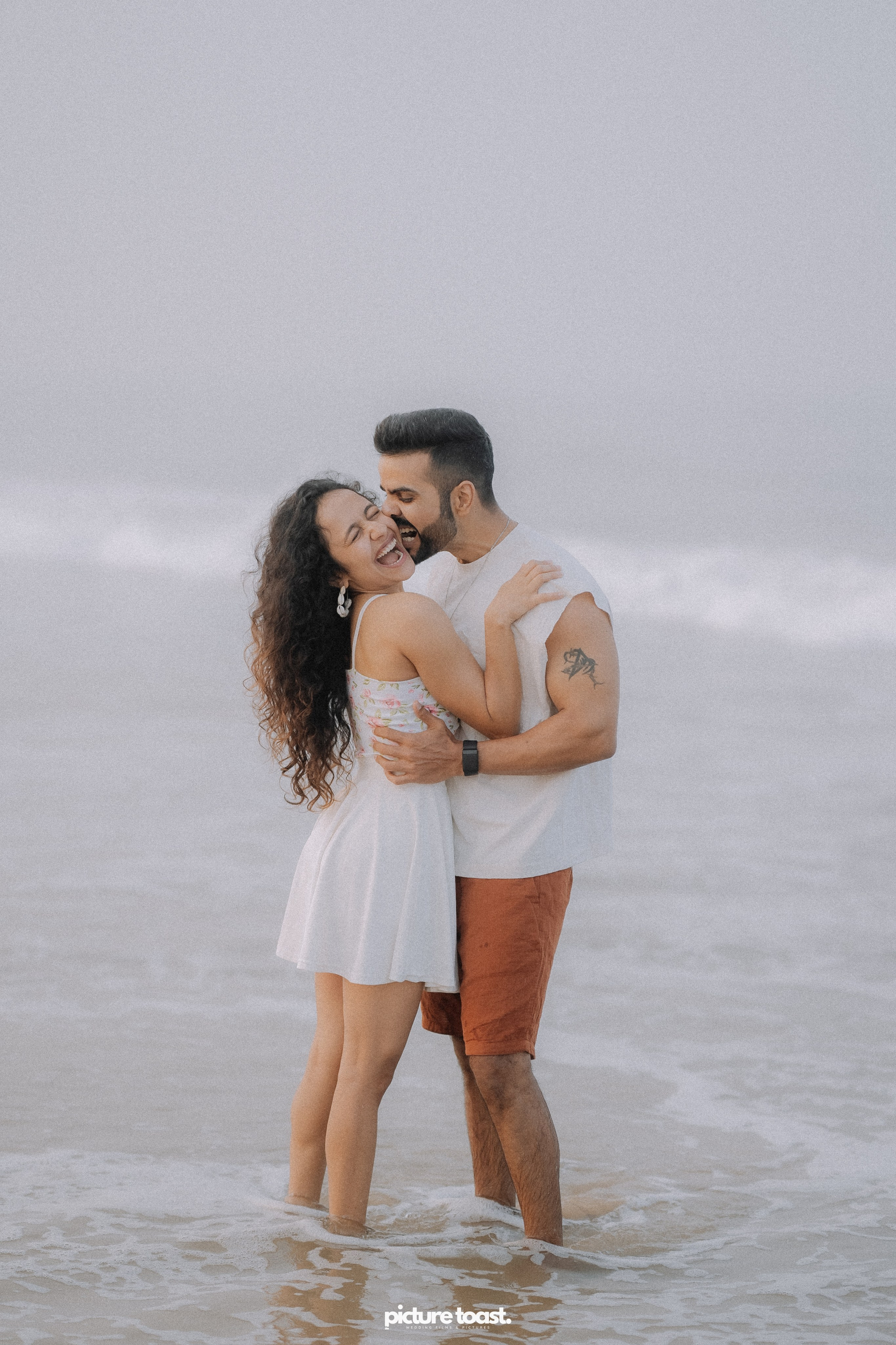 Love In The Beach. Fine art Wedding Photographers in India & Canada