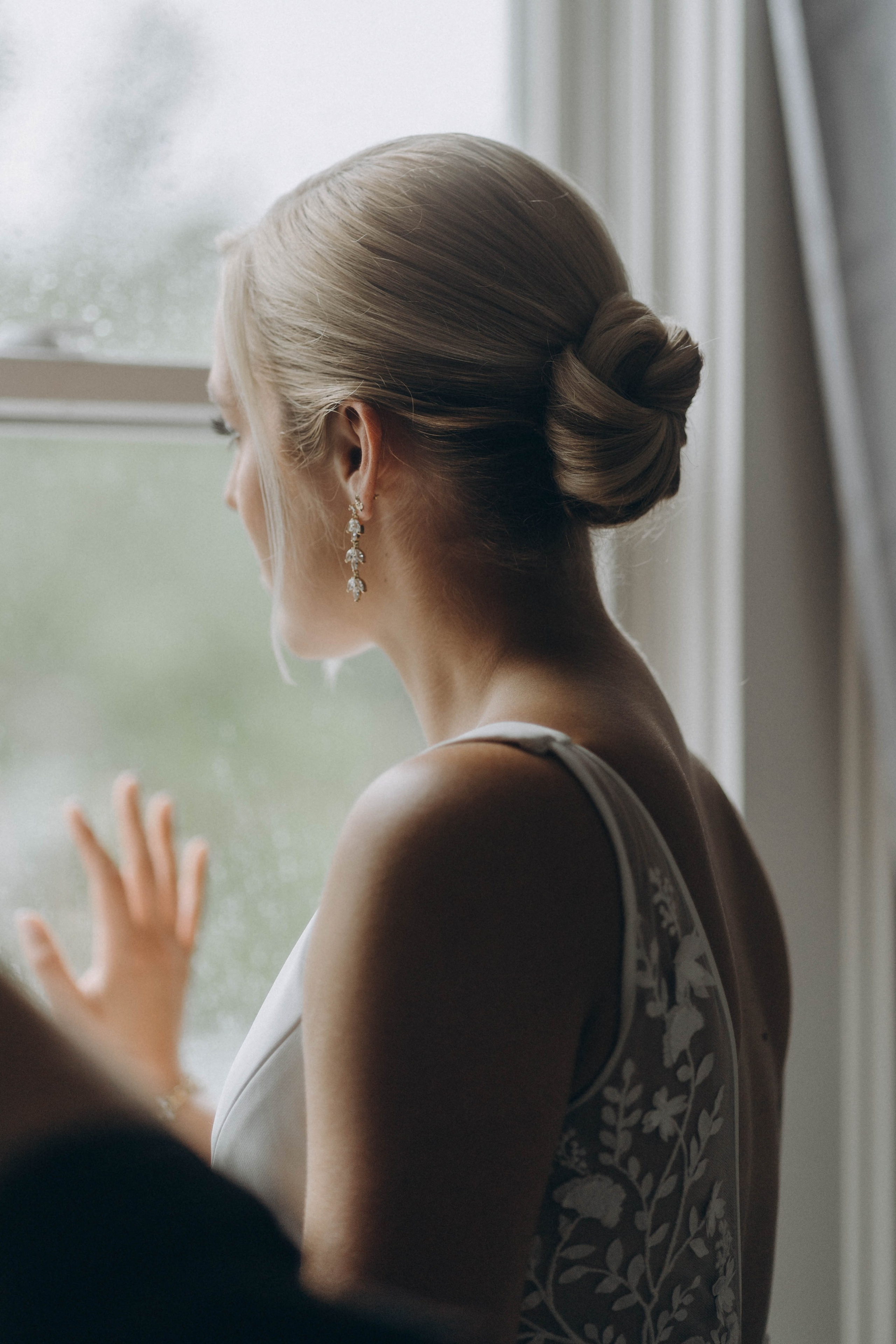 Bride laughing in Saratoga Springs carriage path.