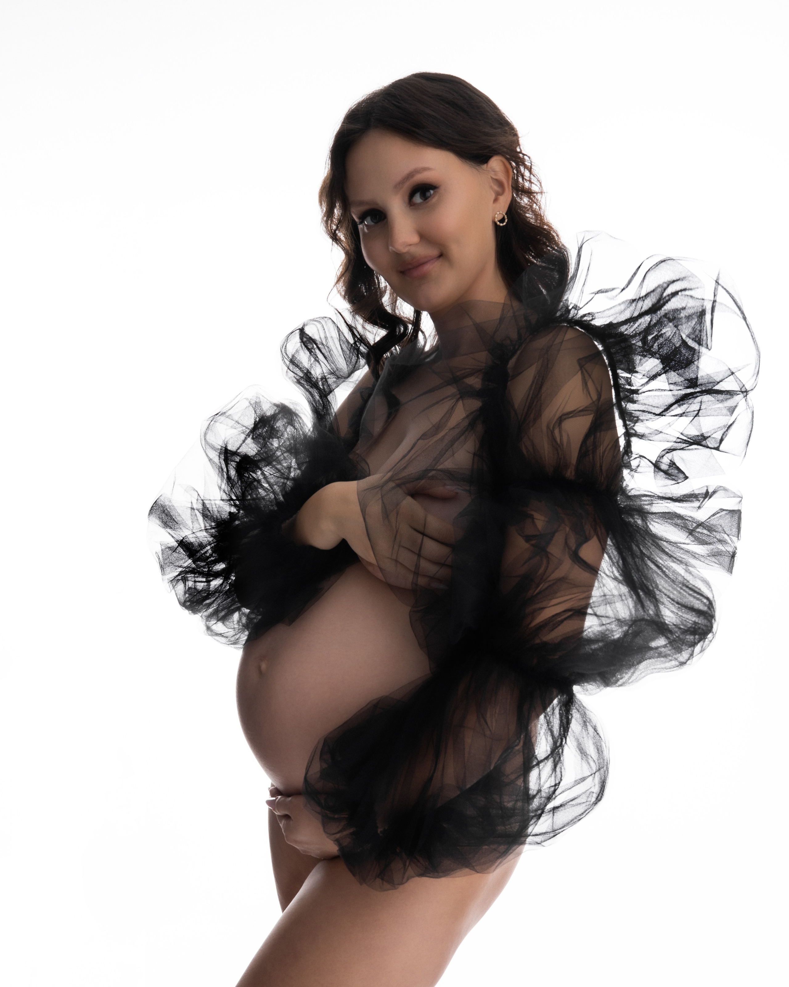 Servizio fotografico gravidanza elegante a Padova, donna incinta in stile leggero e naturale