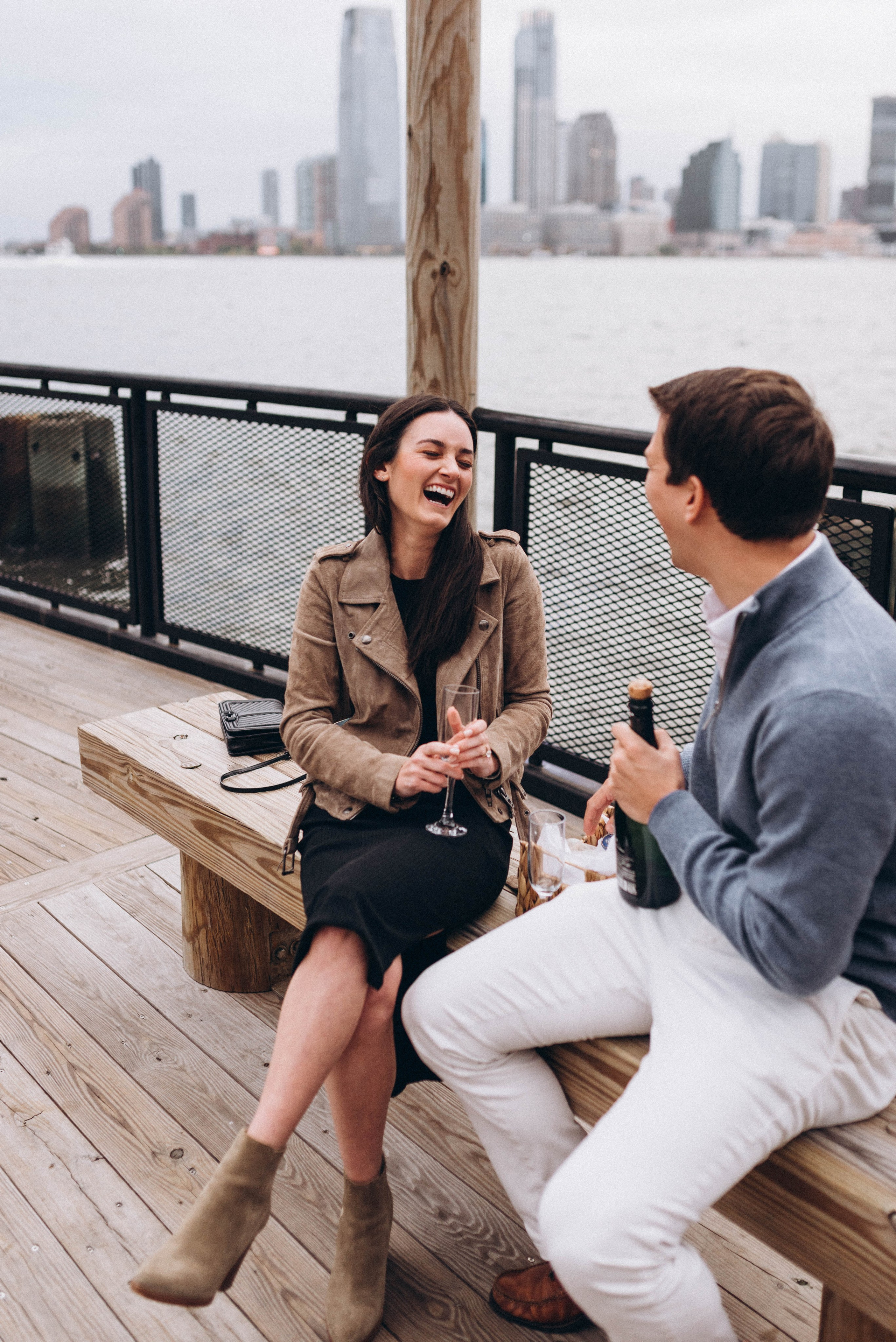 Proposal at Empire State Building during golden sunset.