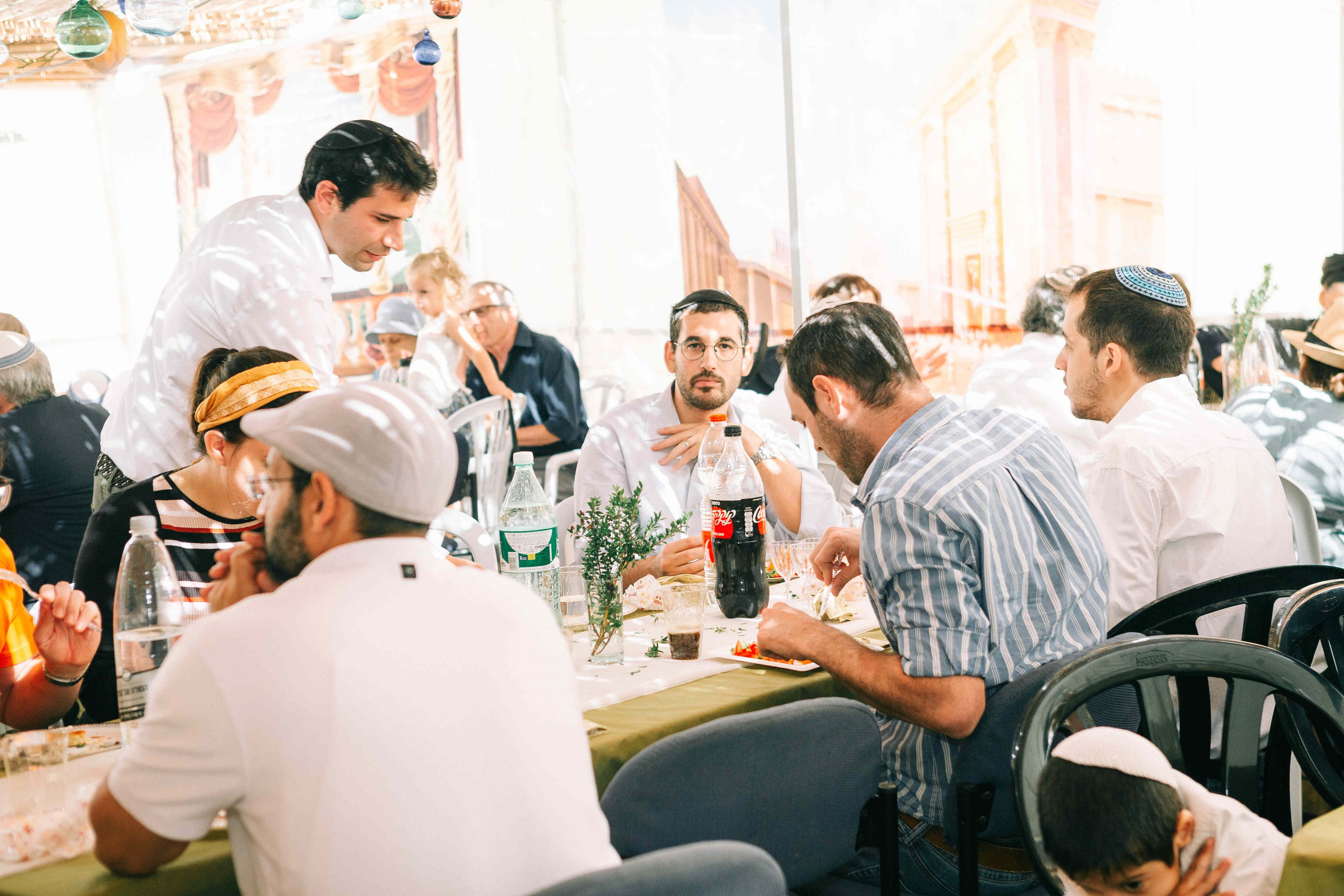 BRITH MILA IN THE SMALL SYNAGOGUE. PHOTOGRAPHER IN ISRAEL