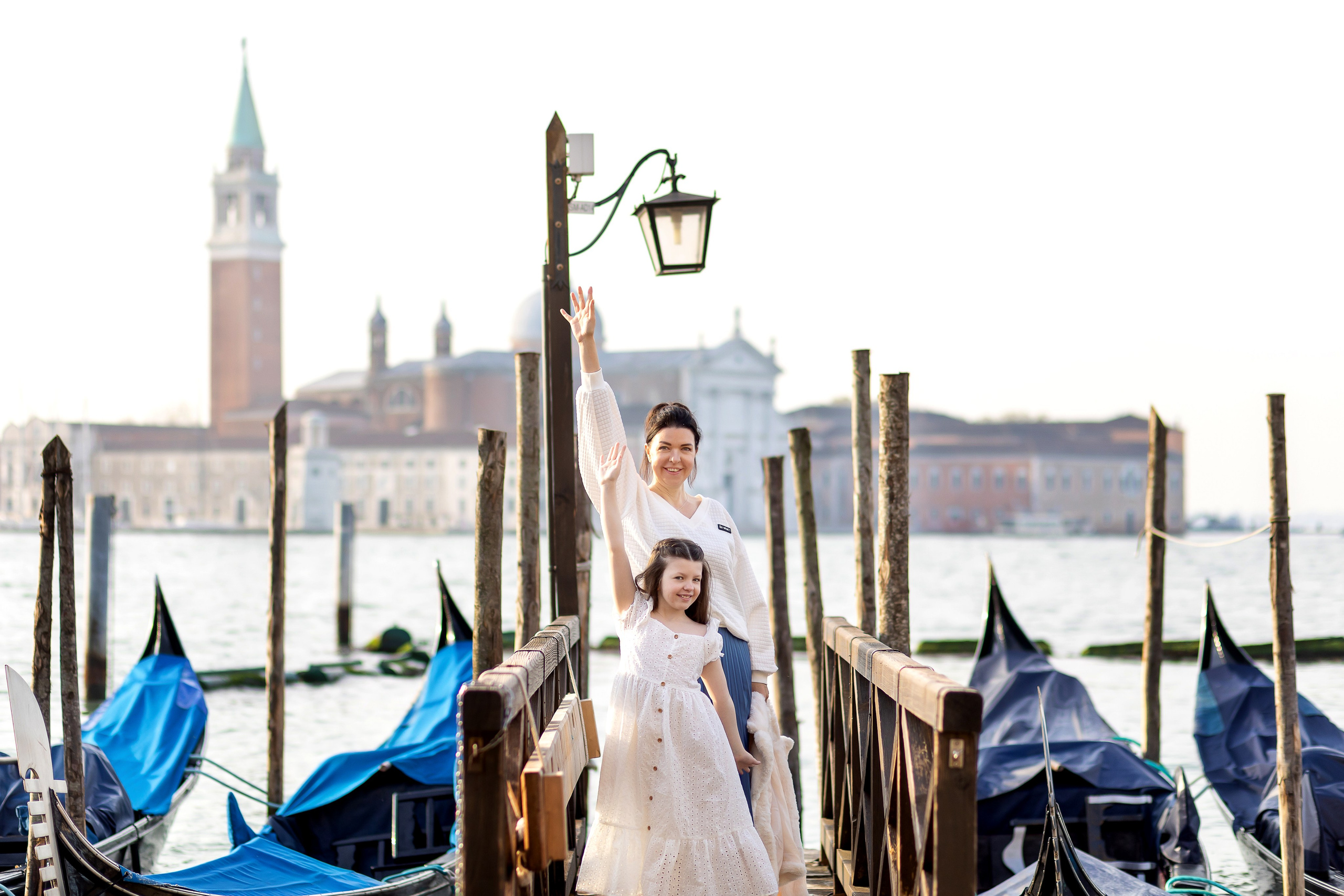 Mother and daughter at sunrise