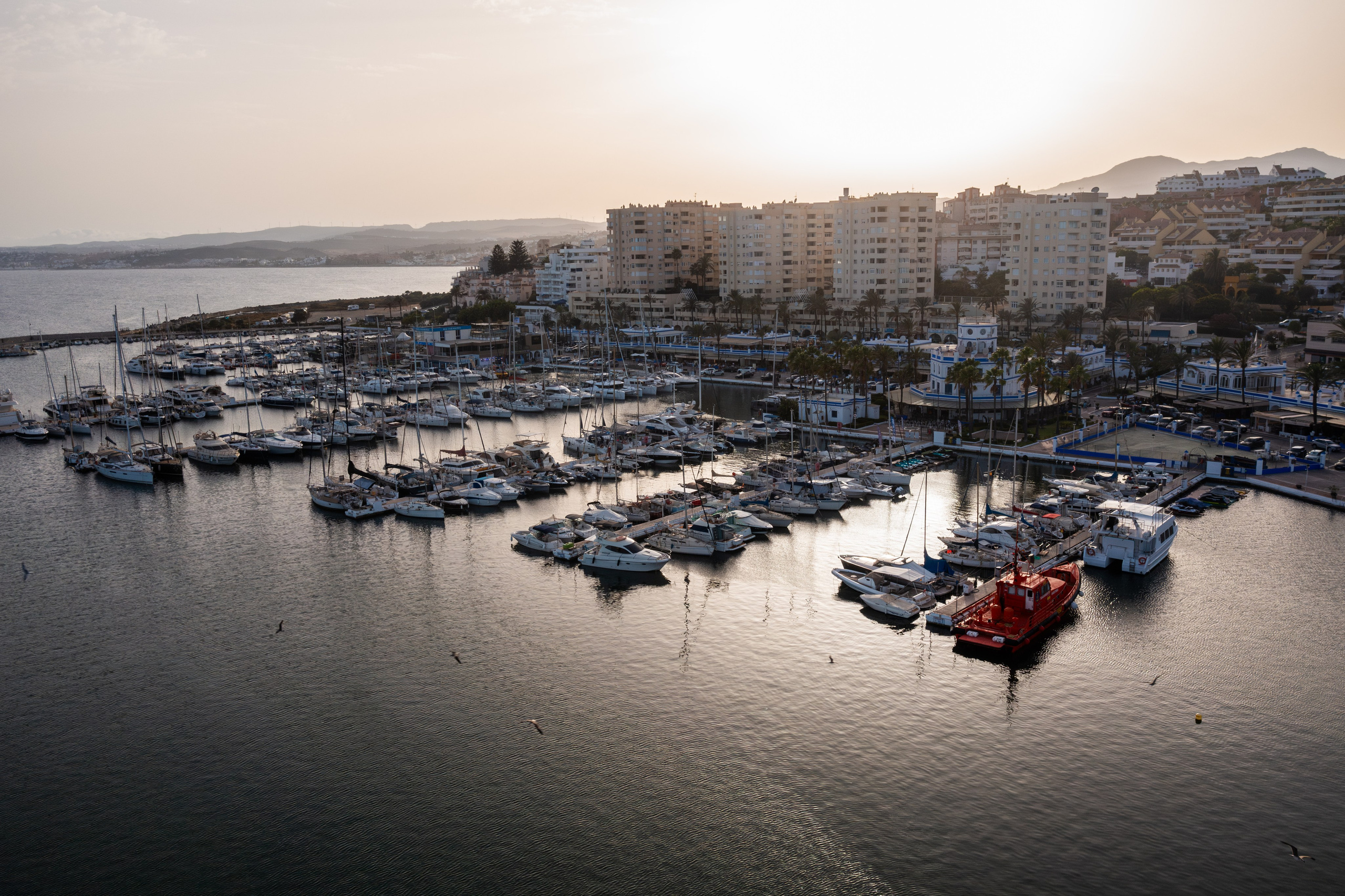 Estepona historic downtown and coastal line seen from above by aerial photographer