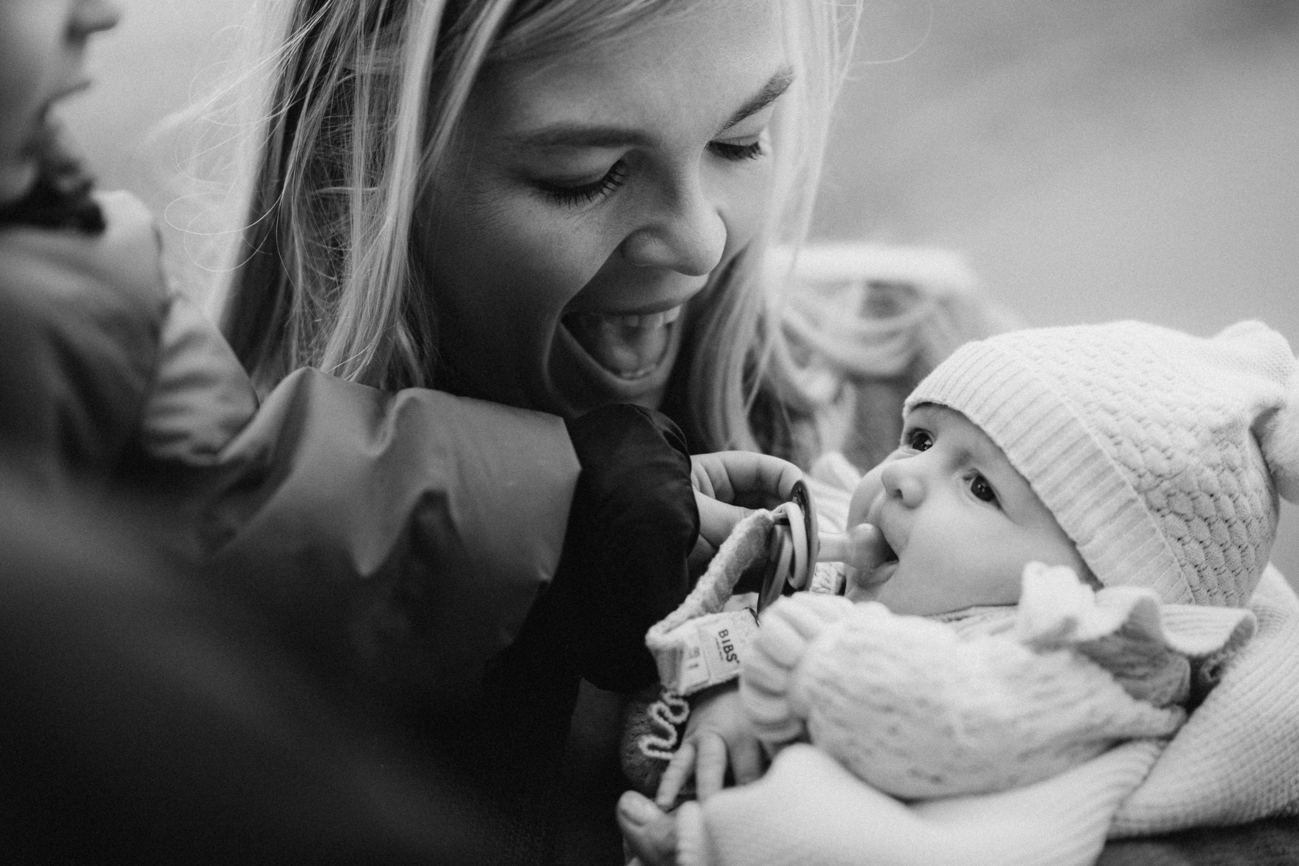 b&w photo of the baby and mother