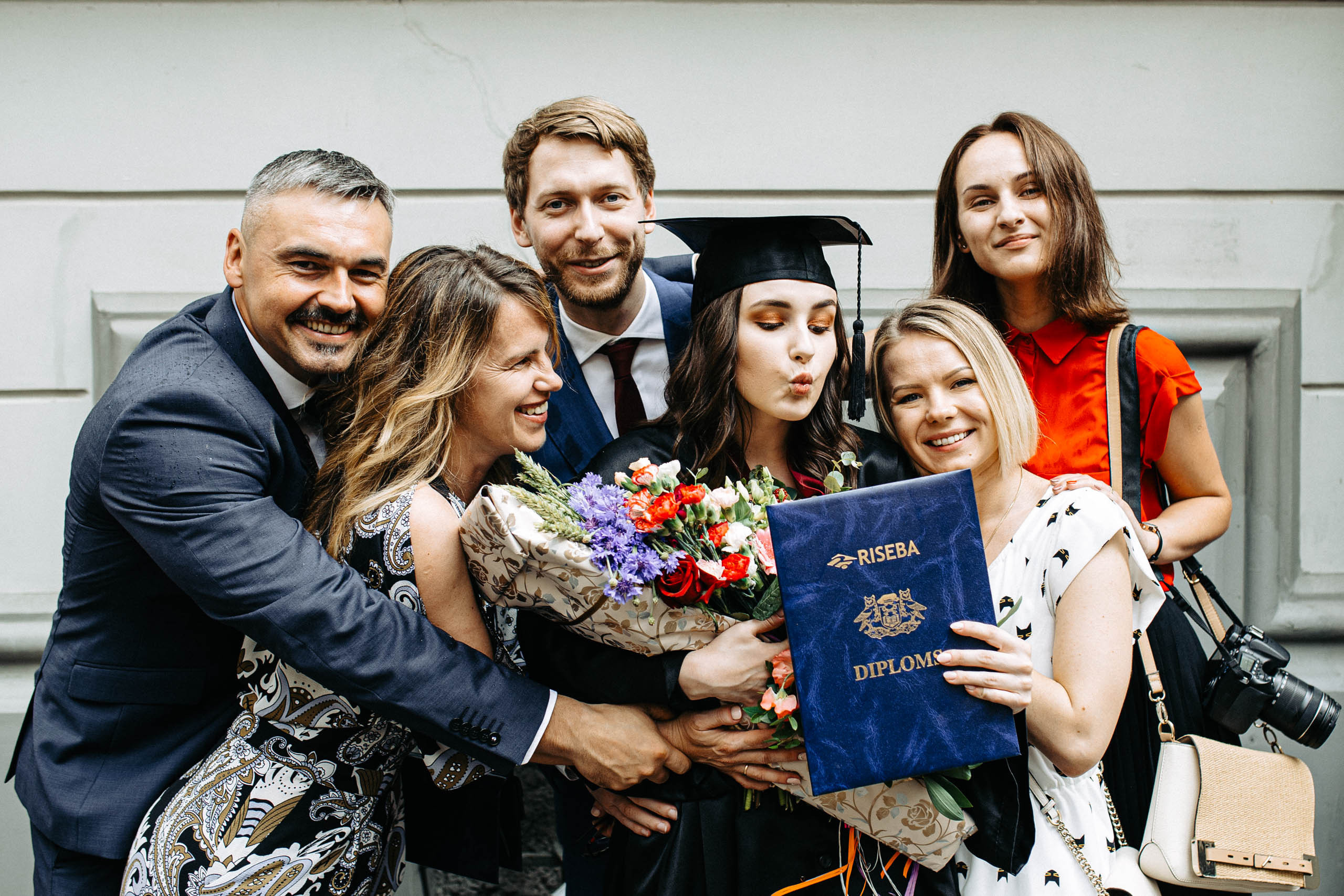 Skolas izlaiduma fotogrāfs