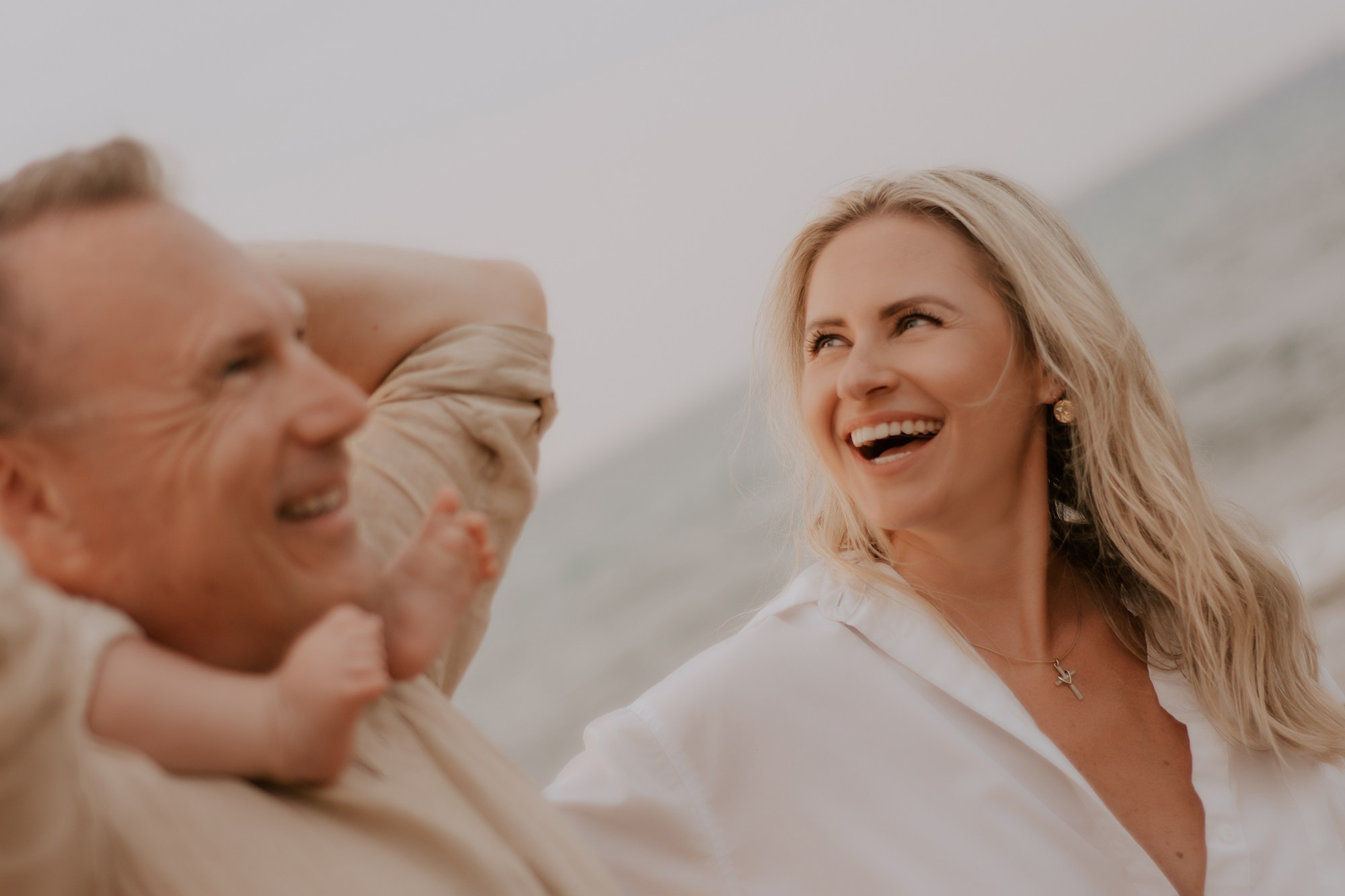 Family photography on the ocean shore. Professional portrait photographer in Los Angeles | Axenia Haritonova