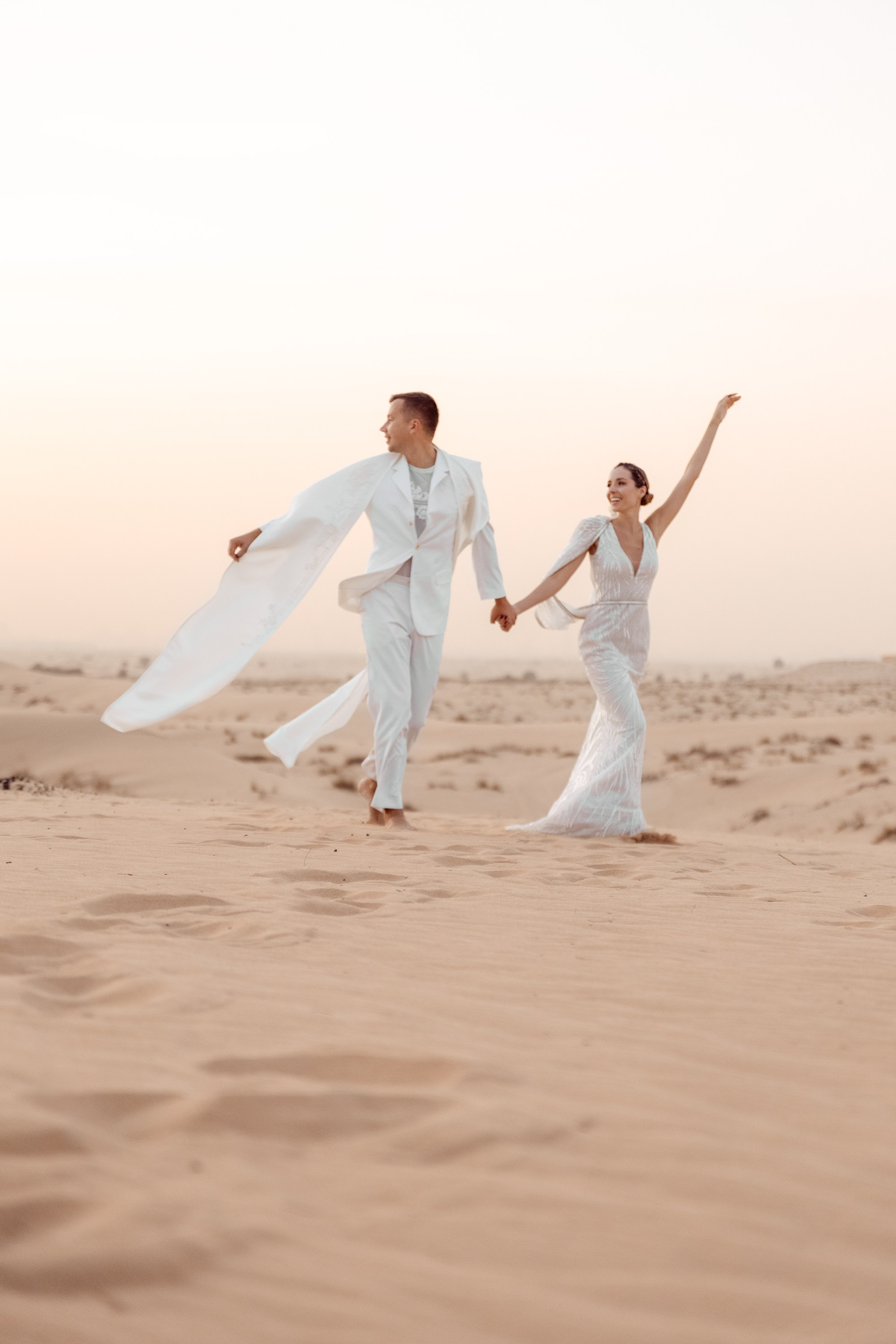 Bride and groom are happy after the ceremony is finished. Dubai, United Arab Emirates