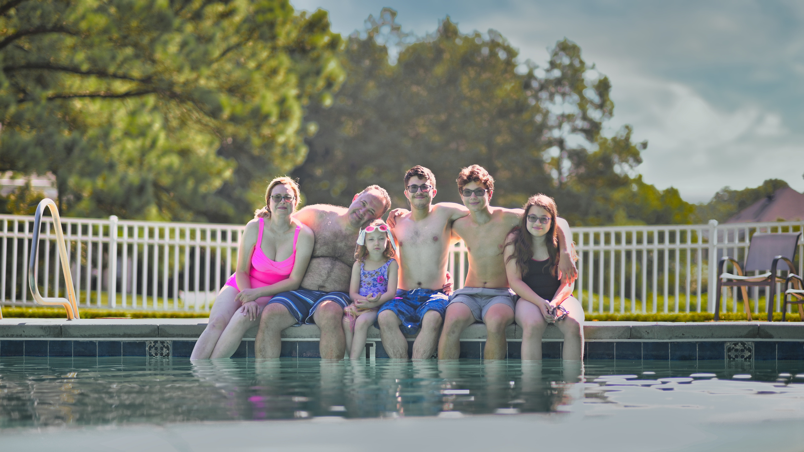Olga and family underwater. Family and Sports photographer in Cary Raleigh NC North Carolina