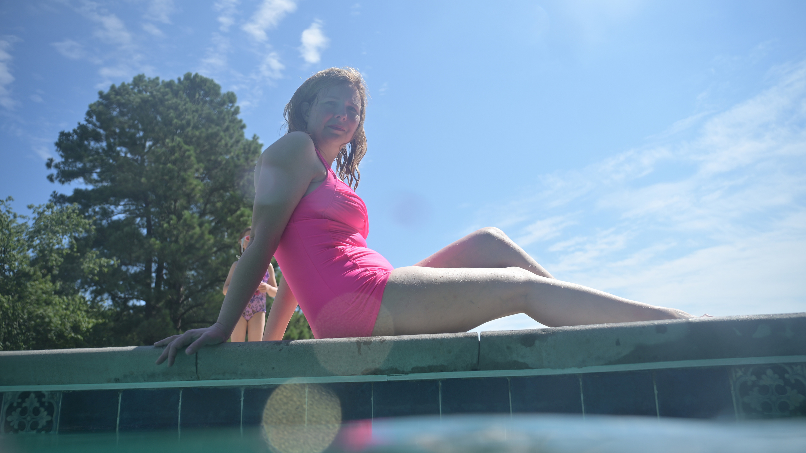 Olga and family underwater. Family and Sports photographer in Cary Raleigh NC North Carolina