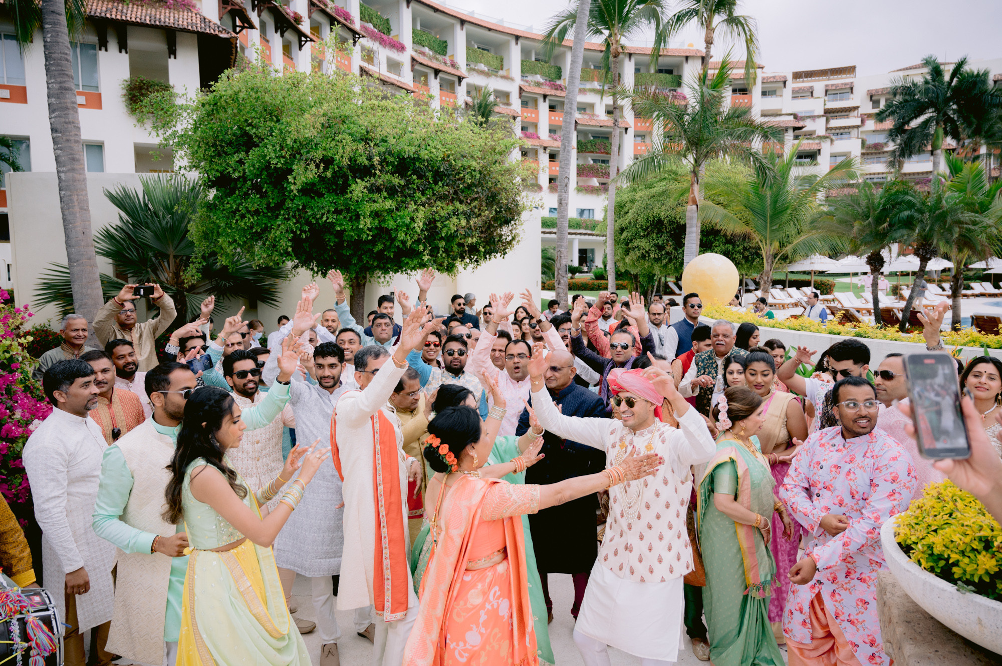 a group of people standing around a man
