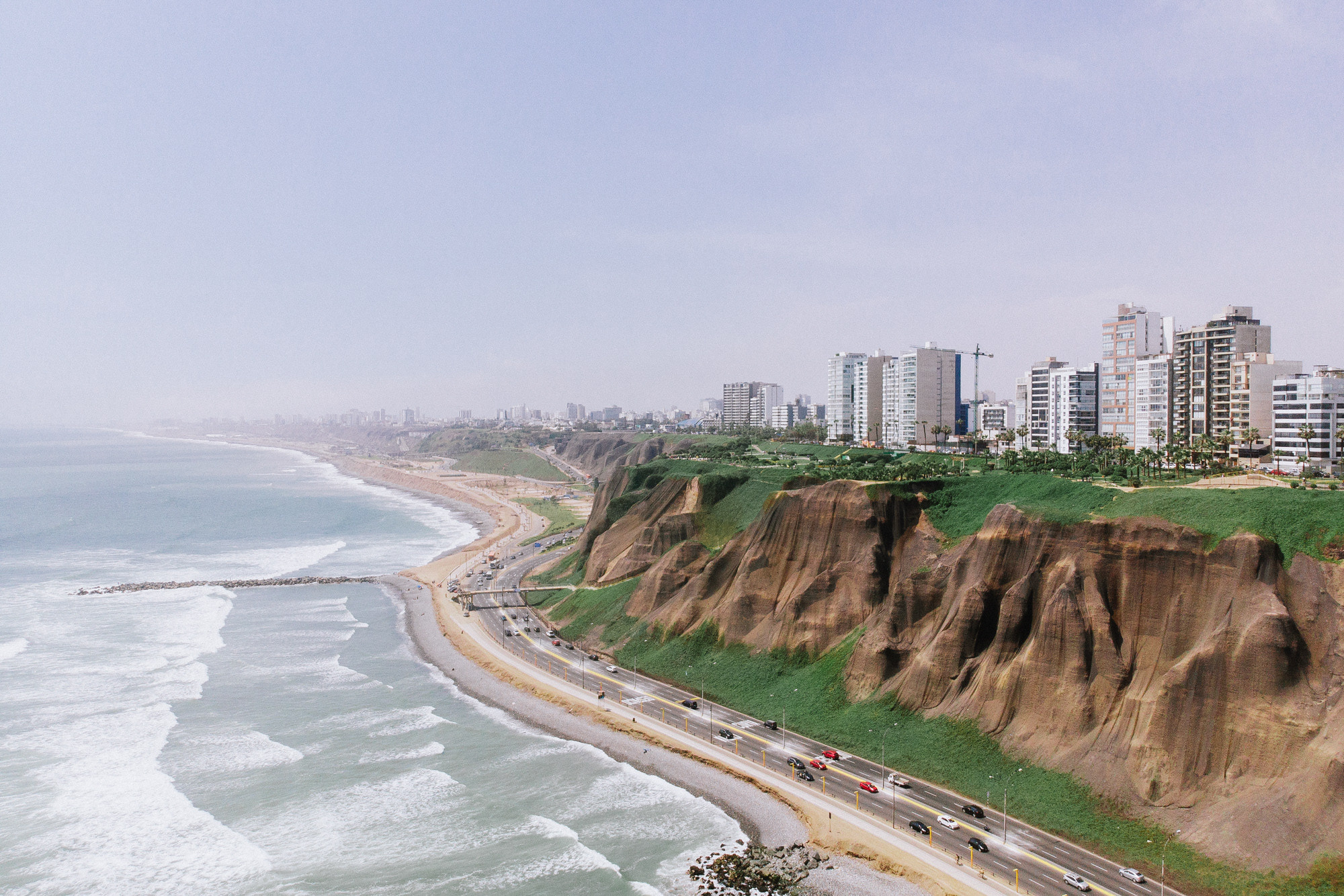 a view of a beach and a city