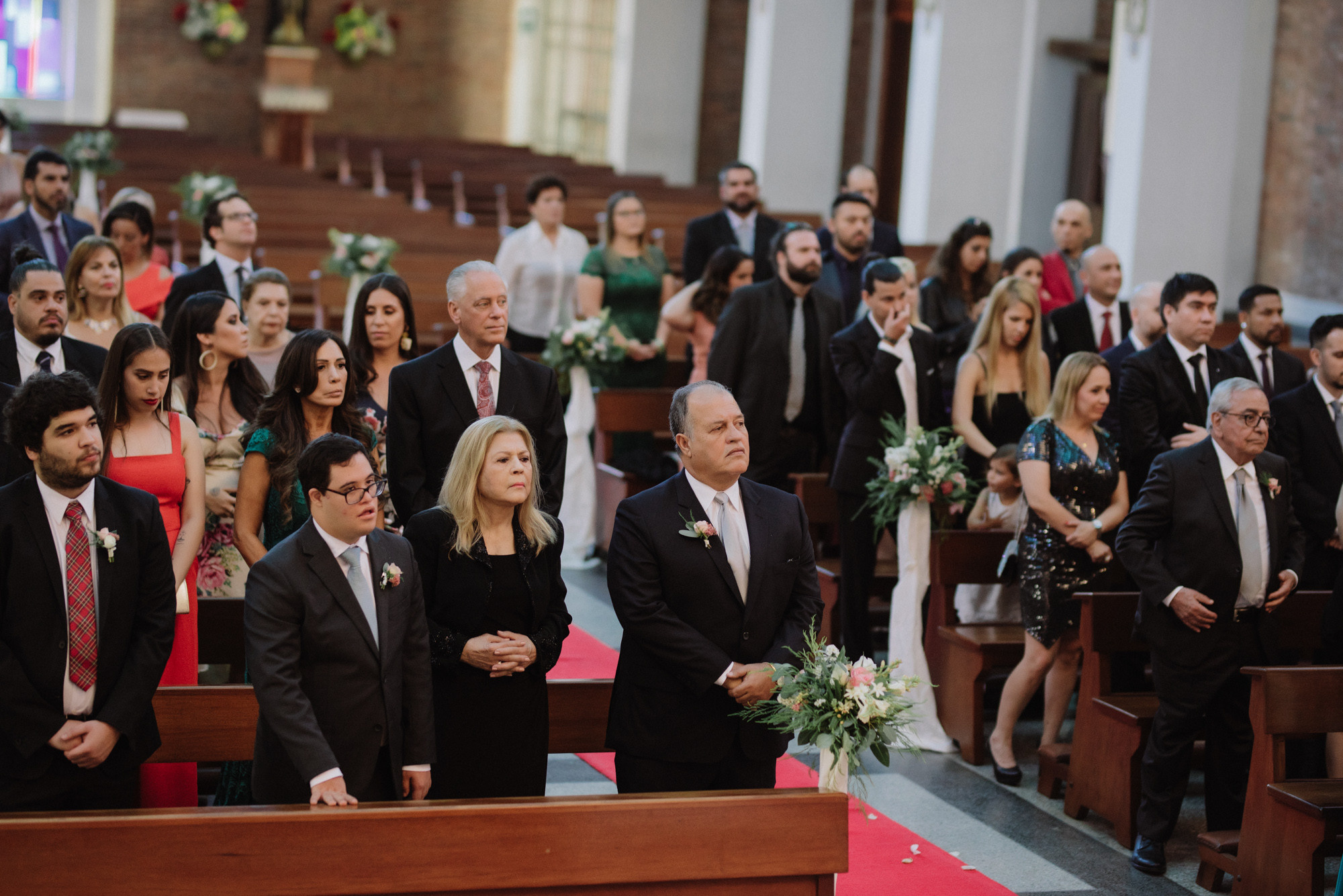 a group of people sitting in a church