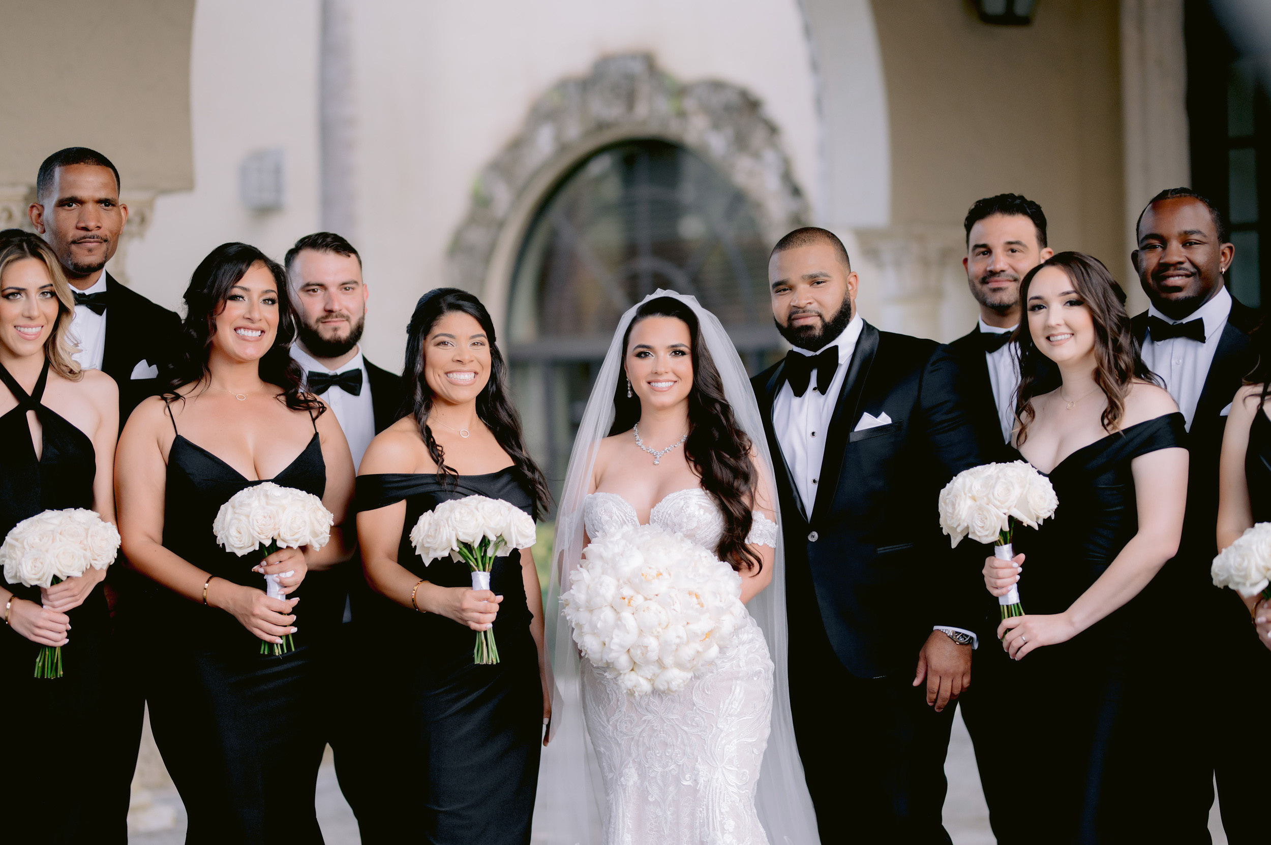 a group of people standing next to each other people