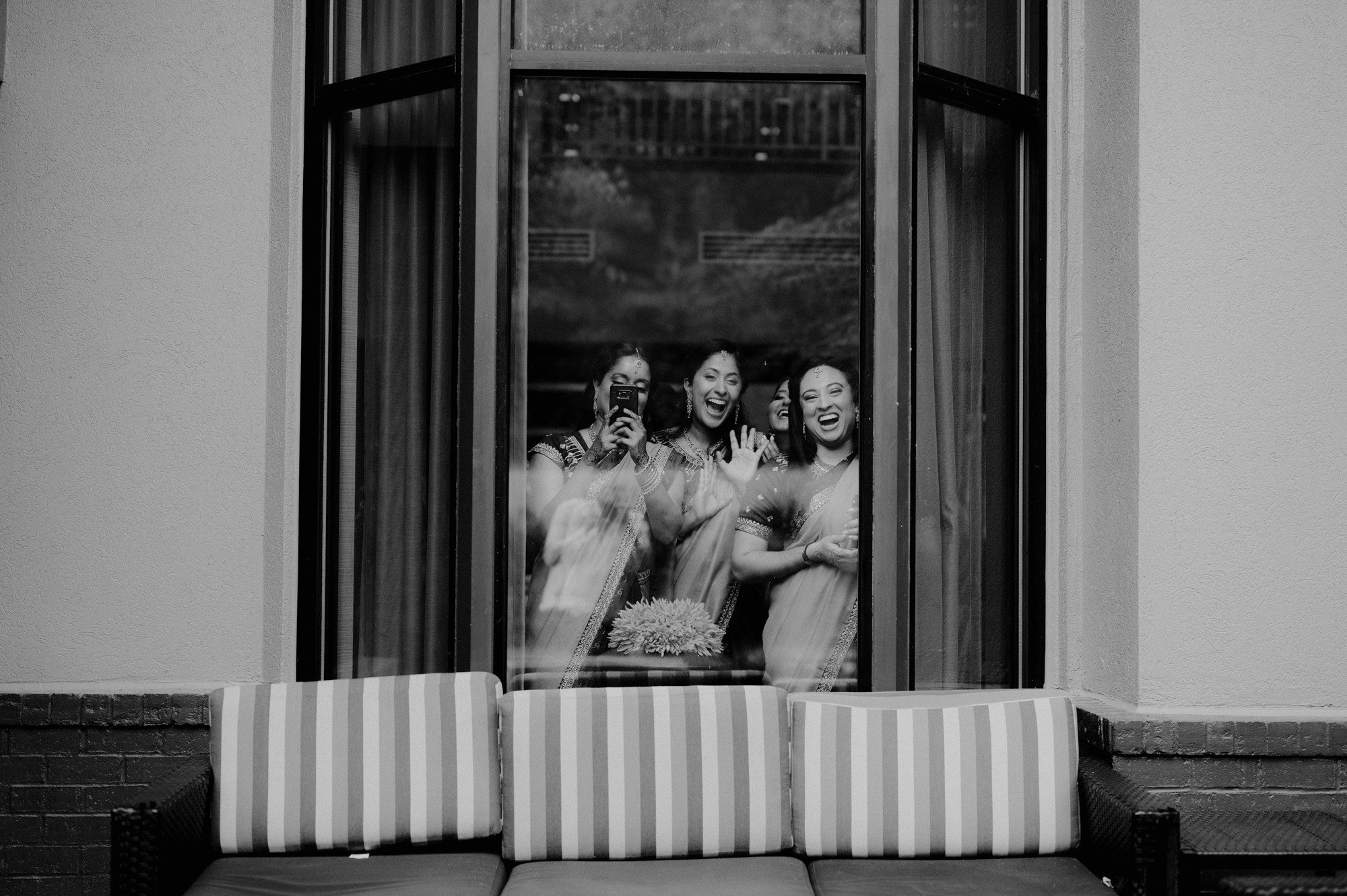 a couple of women sitting on a couch