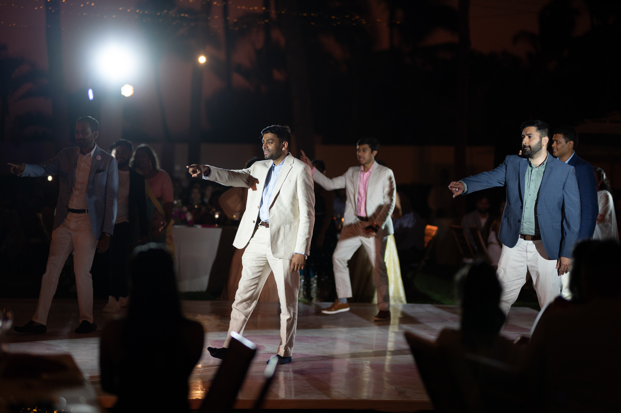 a man in a white suit