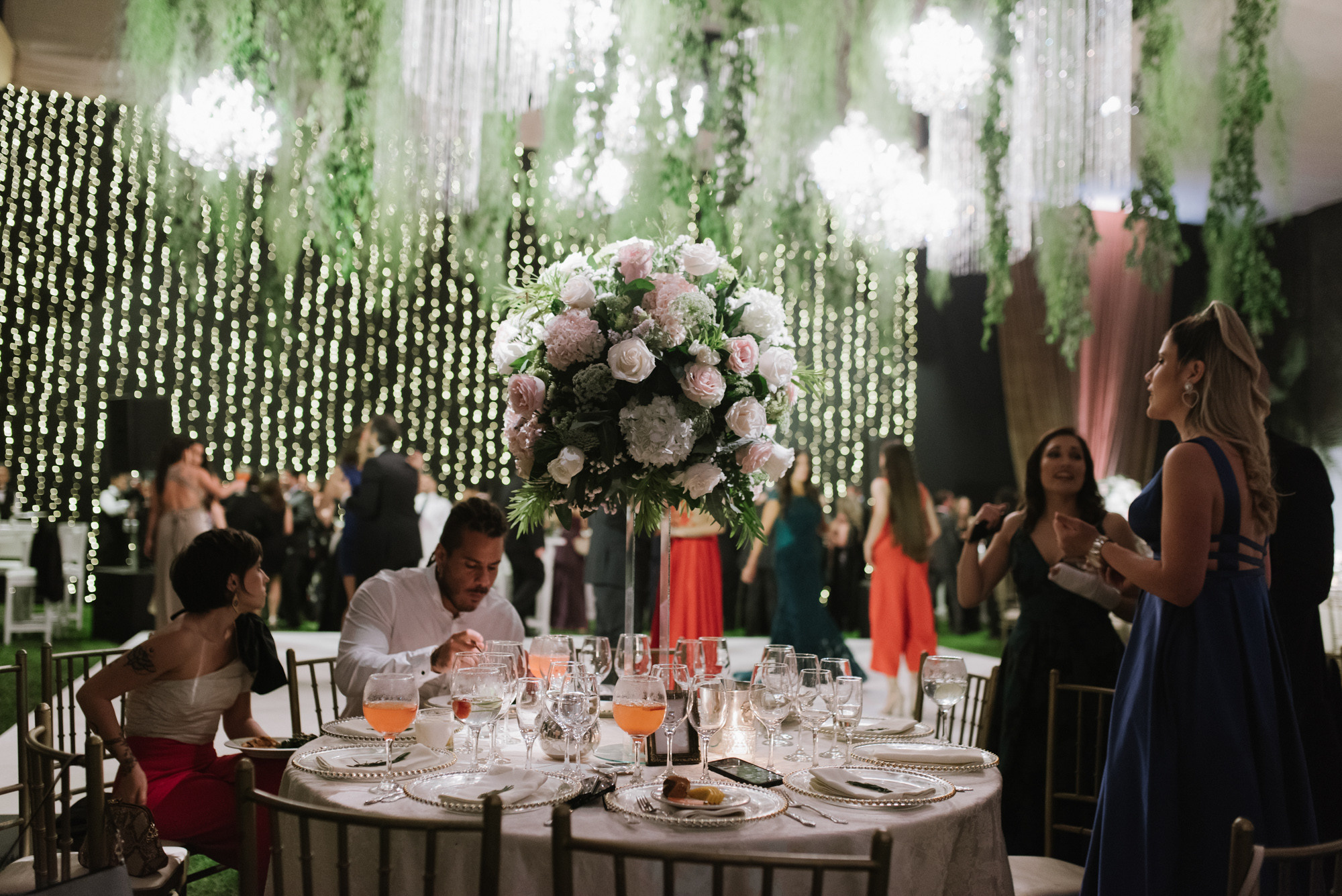 a table with a vase of flowers on it