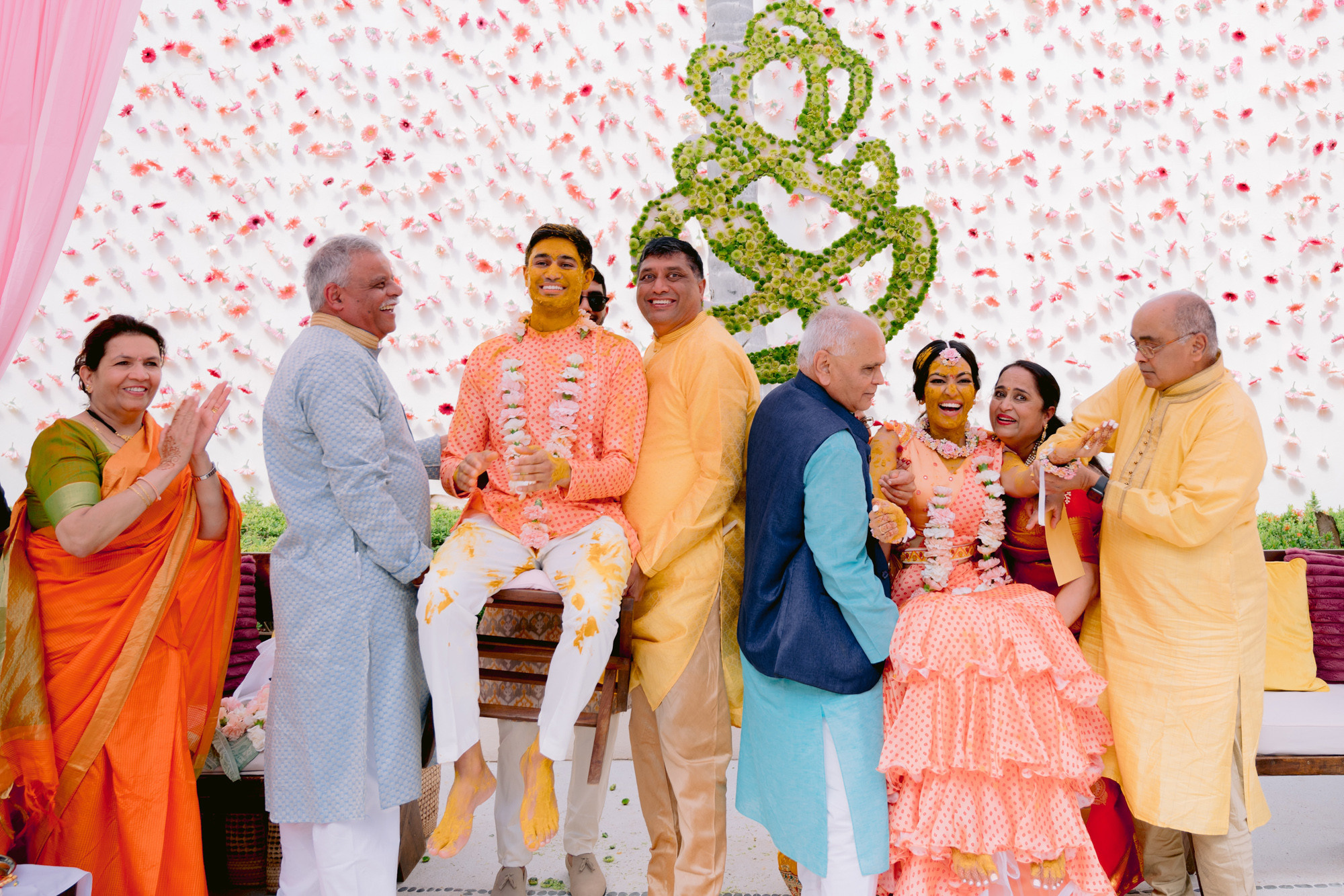 a group of people standing around a man
