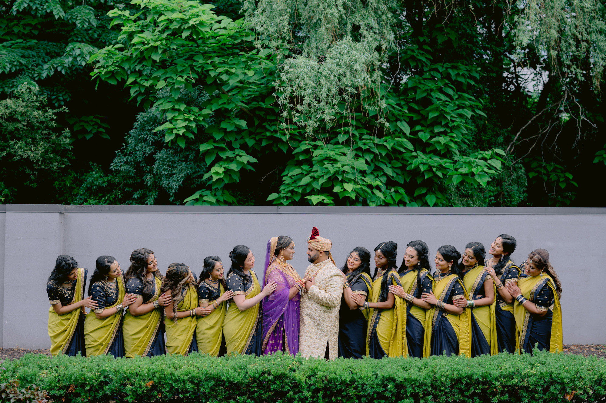 a group of women in yellow sari