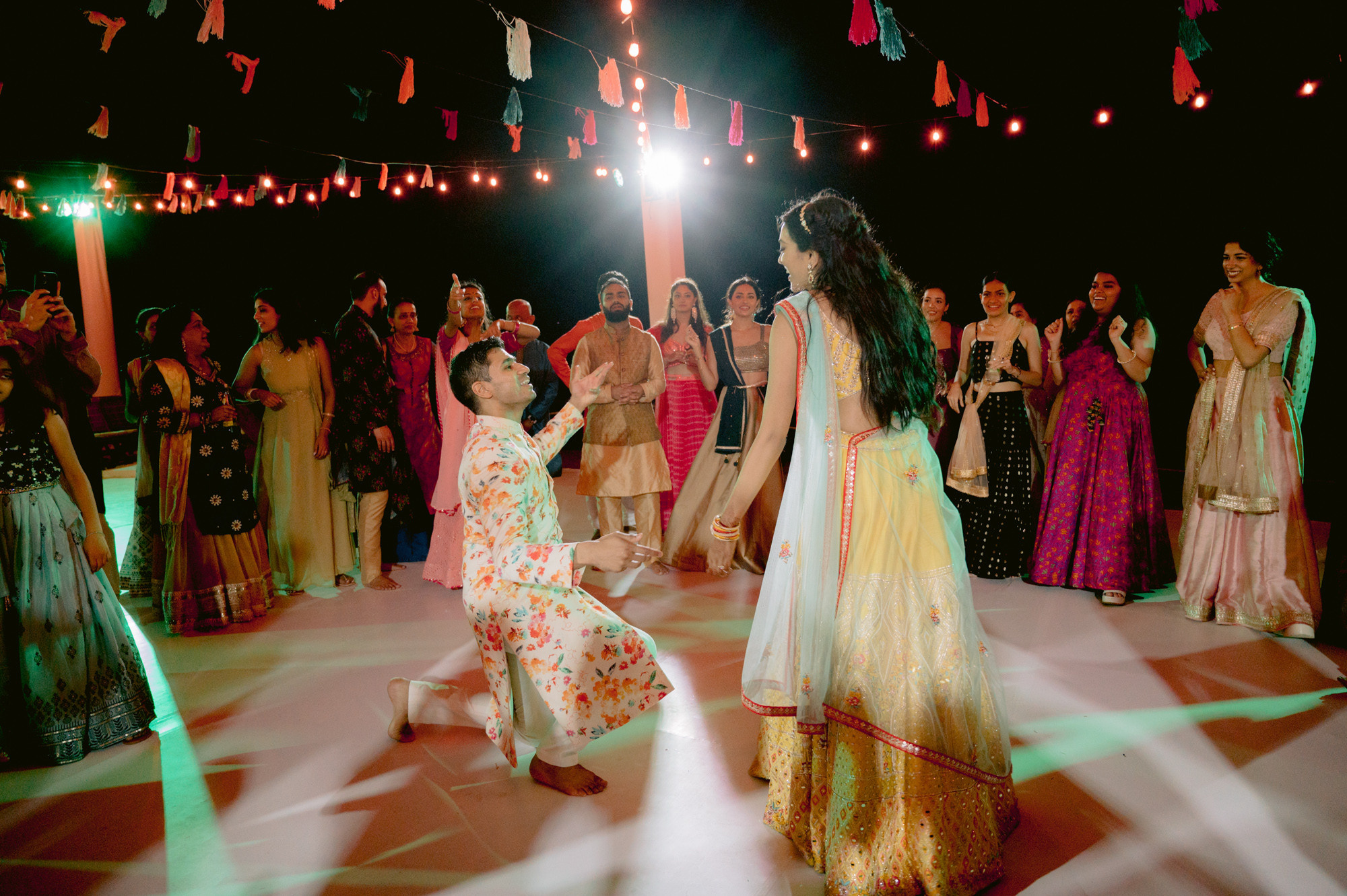 a couple dancing on a dance floor