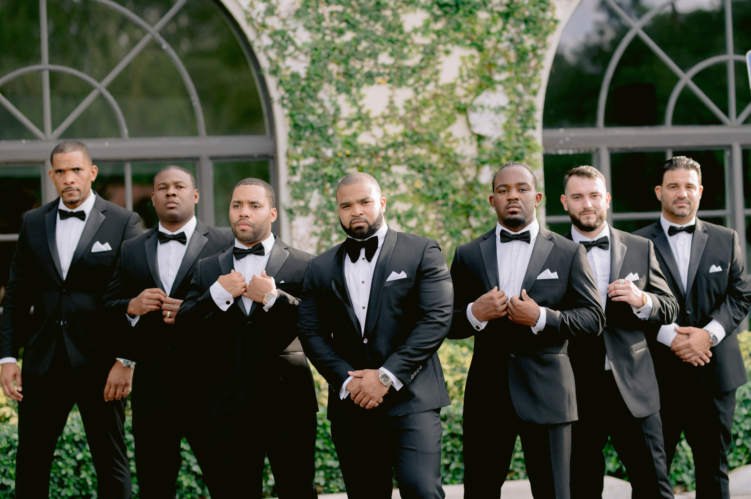 a group of men in tuxed tuxed tuxed tuxed tuxed tuxed tuxed tuxed tuxed tuxed tuxed tu