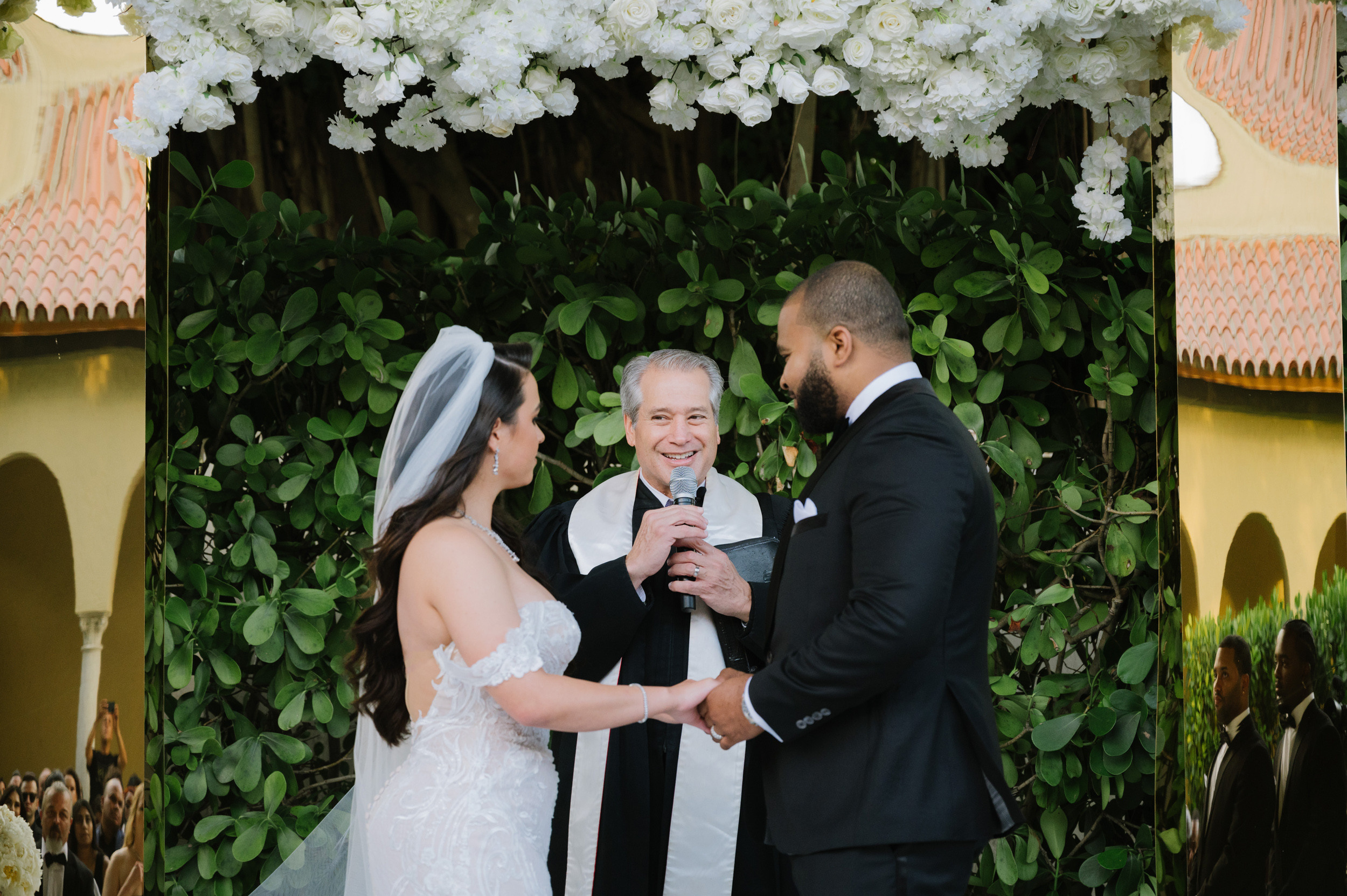 a bride and groom are exchanging during their wedding ceremony