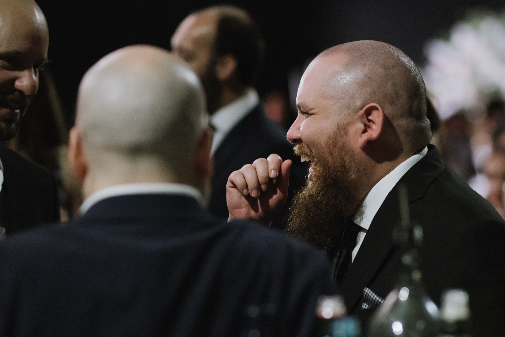 a man with a beard and a suit