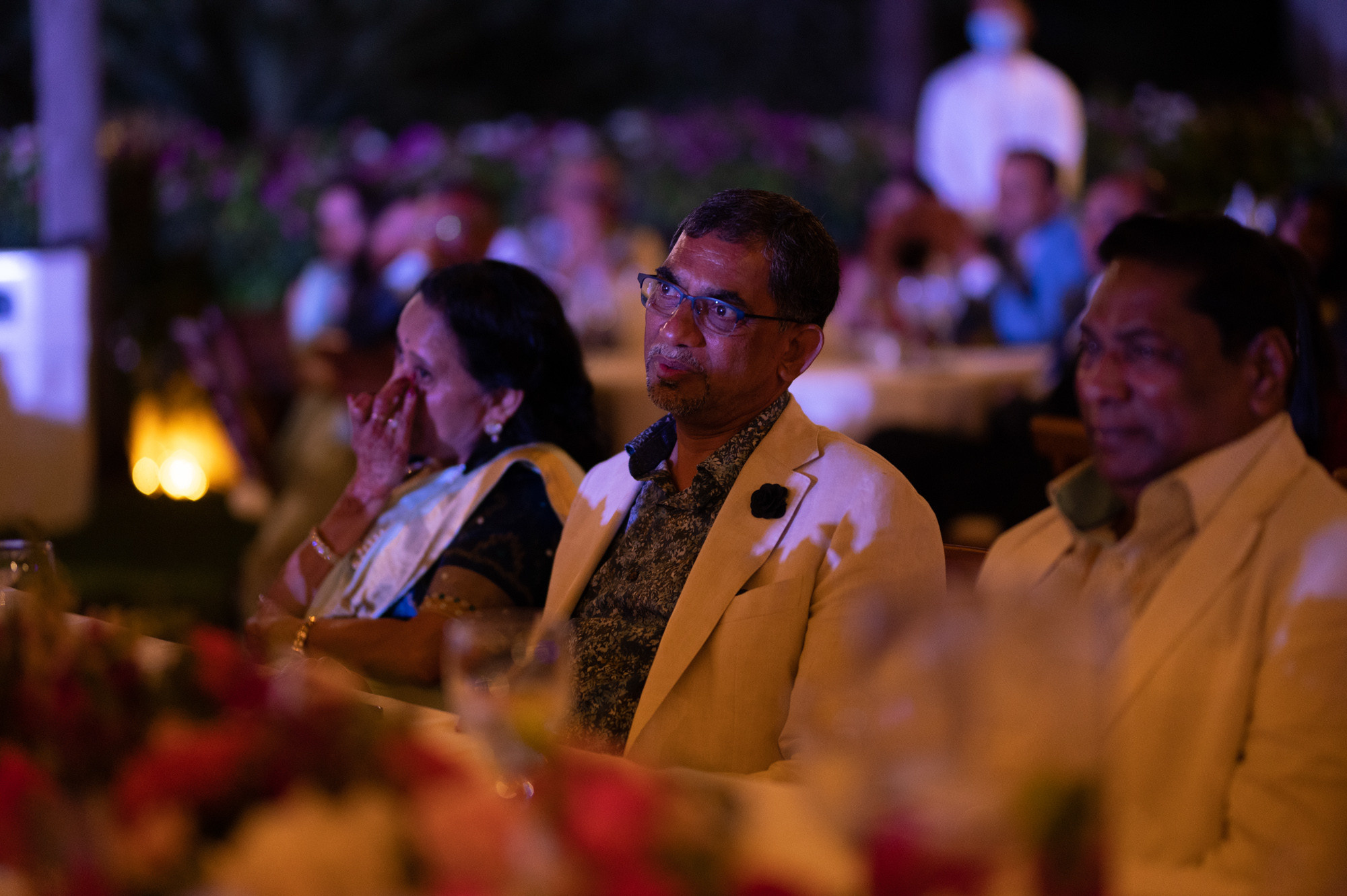 a group of people sitting at a table