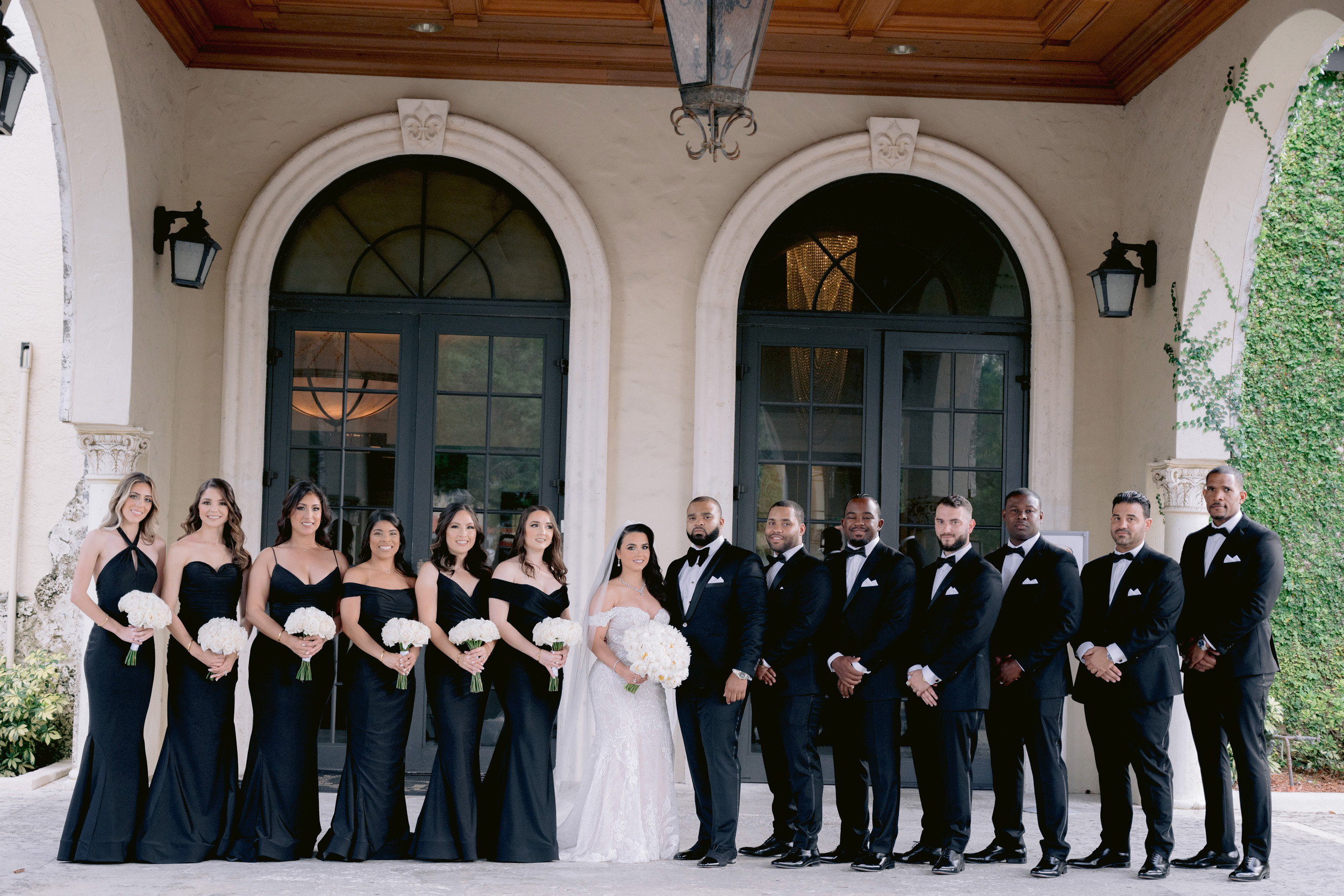 a group of people standing in front of a building