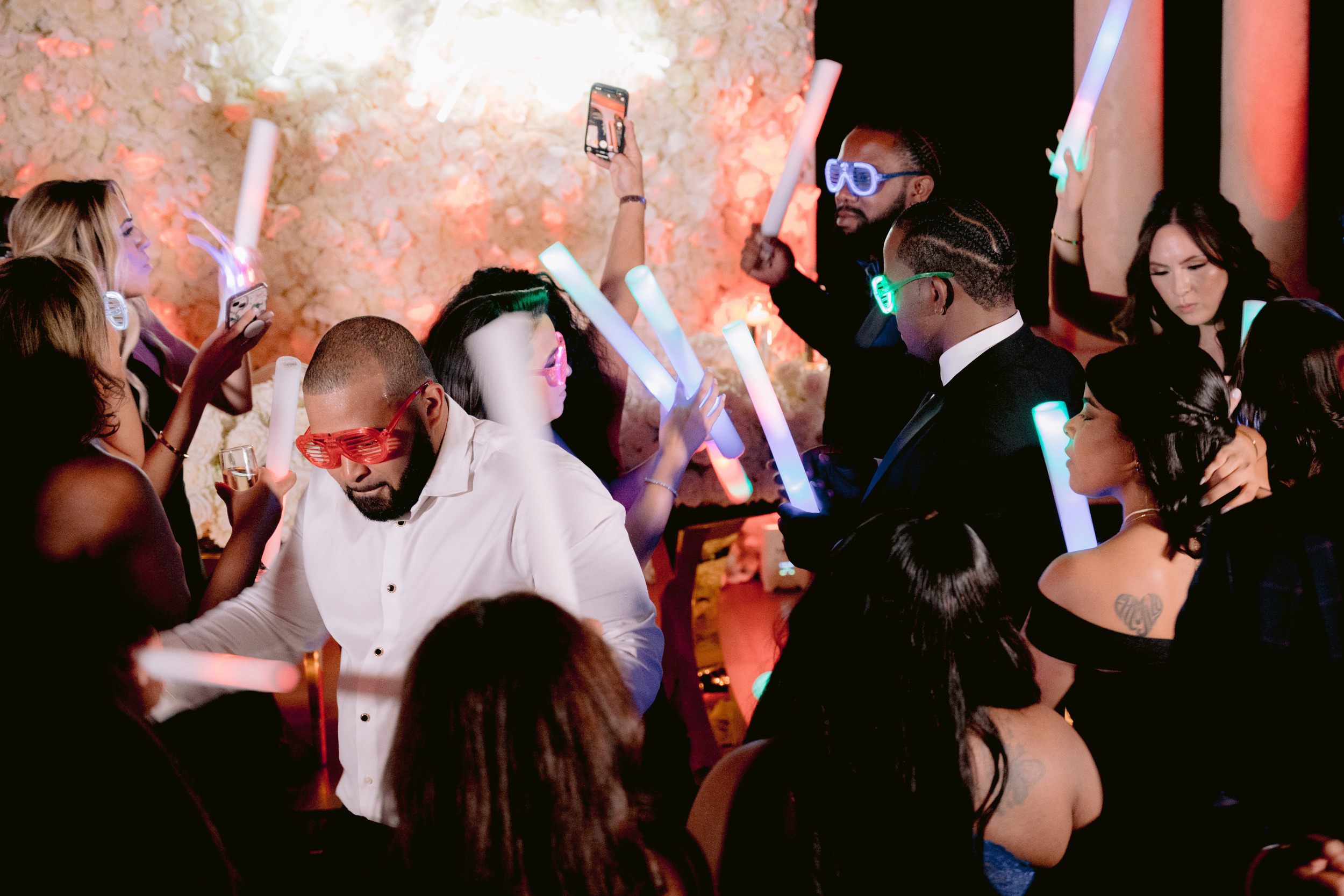 a group of people dancing at a party