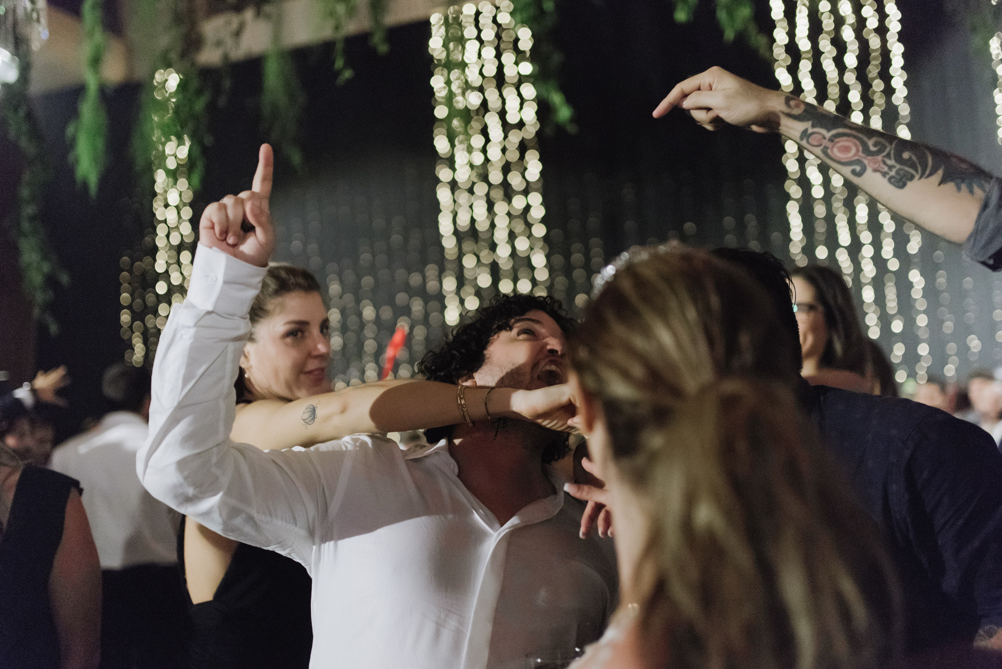 a man and woman dancing at a wedding