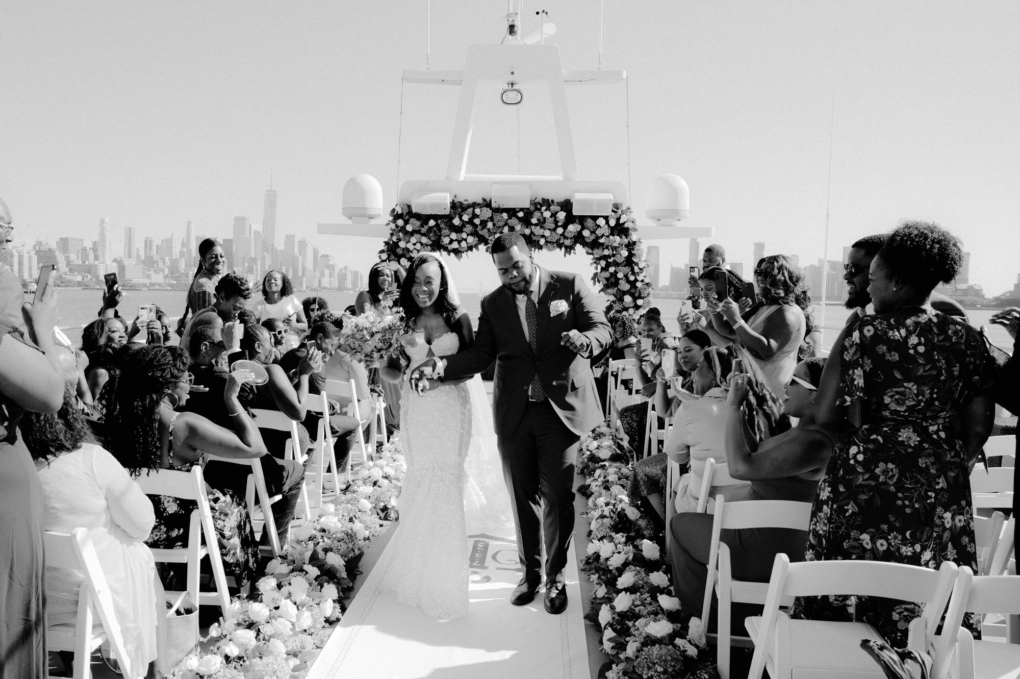 a couple walking down the aisle at their wedding
