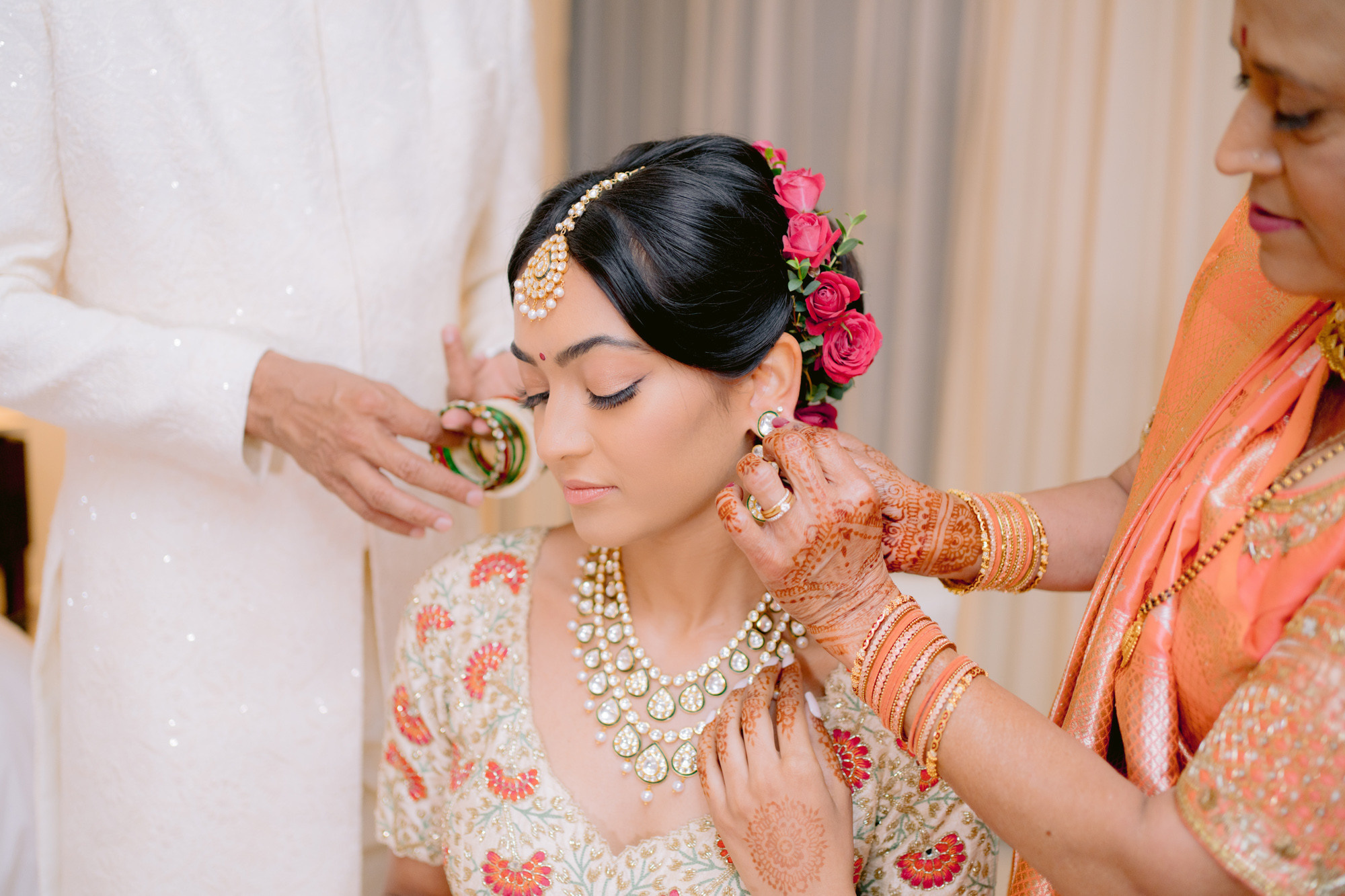a bride getting her makeup done