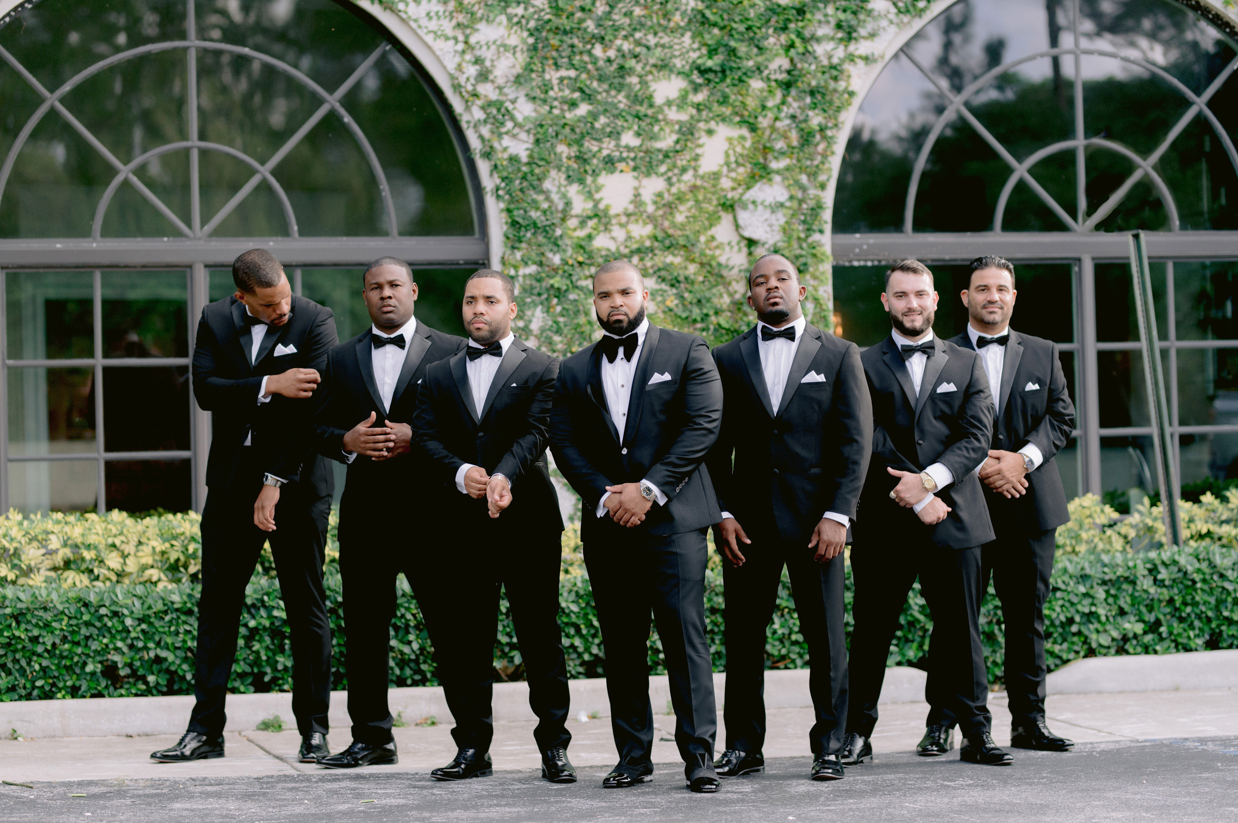 a group of men in tuxed tuxed tuxed tuxed tuxed tuxed tuxed tuxed tuxed tuxed tuxed tu